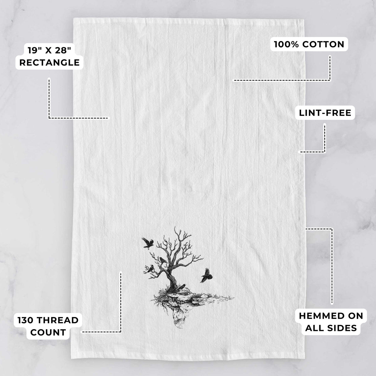 White tea towel printed with a black ink illustration of a bare twisted tree on a small island with ravens flying around it, with feature labels: 19 by 28 inch rectangle, 100% cotton, lint-free, 130 thread count, hemmed on all sides.