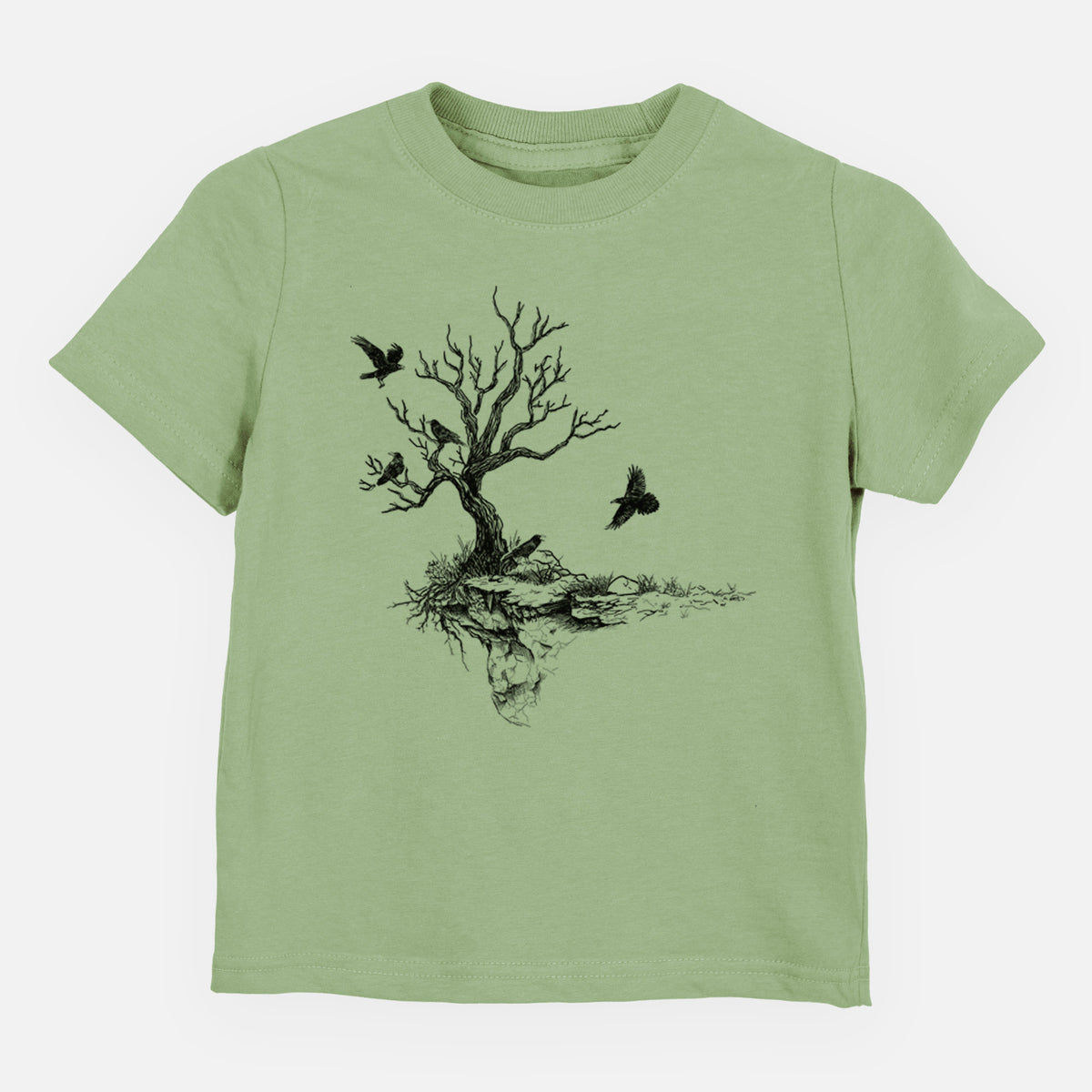 Sage green toddler t-shirt laid flat, printed with a black ink illustration of a bare twisted tree on a small island with ravens flying around it.