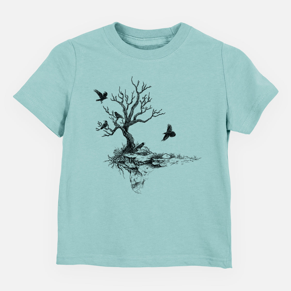 Saltwater toddler t-shirt laid flat, printed with a black ink illustration of a bare twisted tree on a small island with ravens flying around it.
