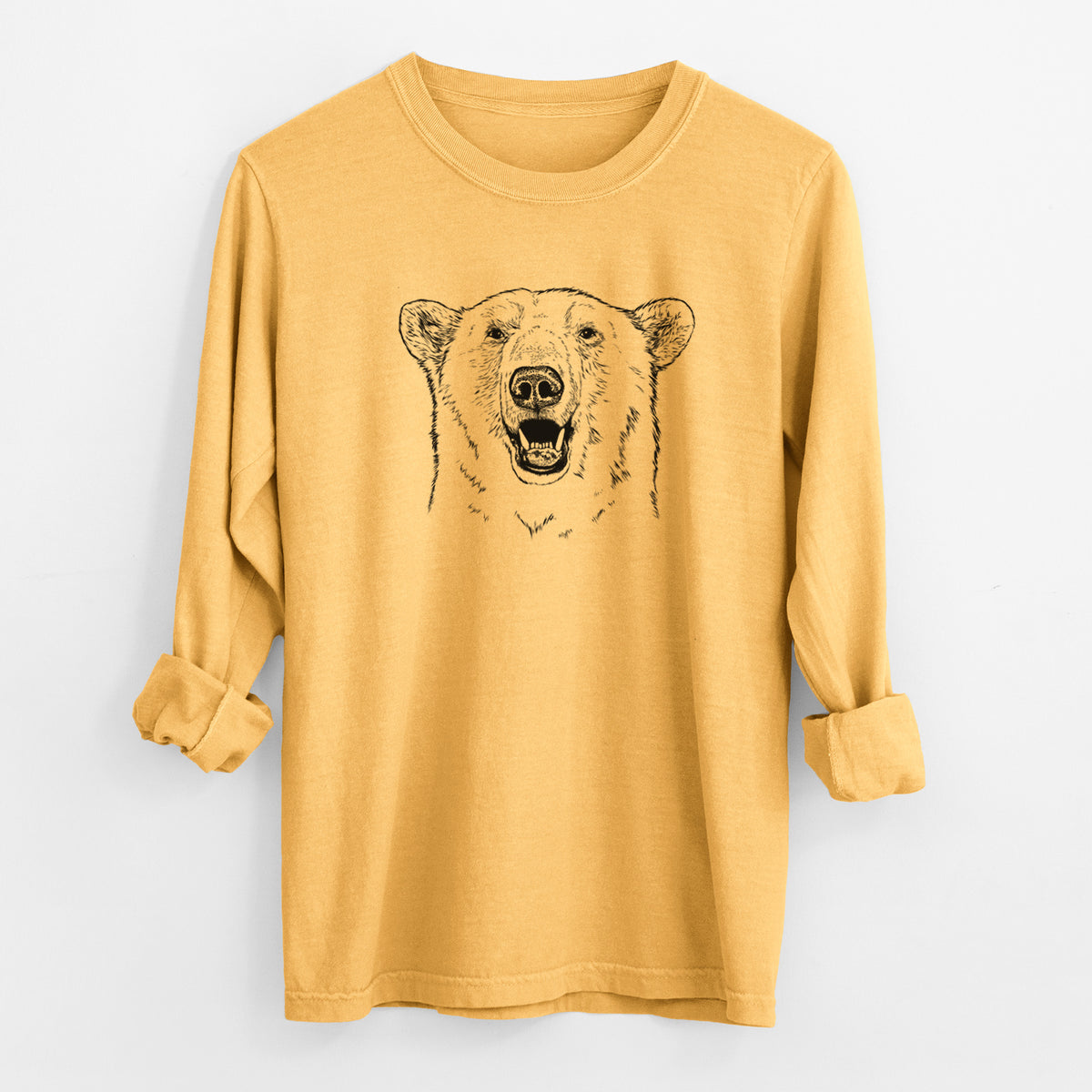 Golden wheat yellow Comfort Colors long sleeve shirt laid flat with the cuffs rolled, printed with a black ink portrait of a smiling polar bear's face.