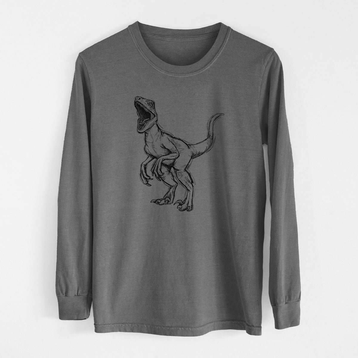 Pepper Comfort Colors long sleeve shirt laid flat, printed with a black ink illustration of a Velociraptor roaring.