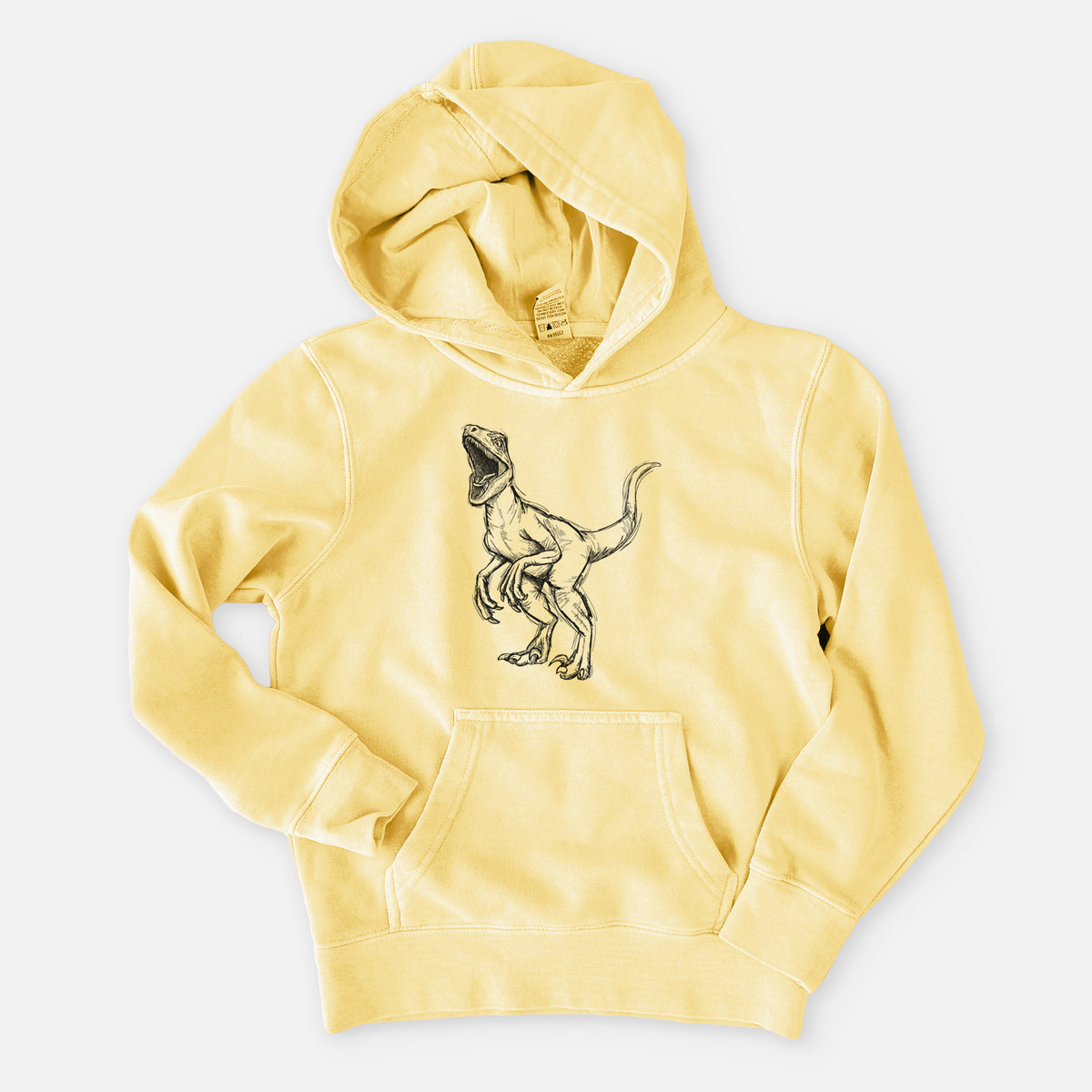 Pigment yellow youth pigment dyed hoodie laid flat, printed with a black ink illustration of a Velociraptor roaring.