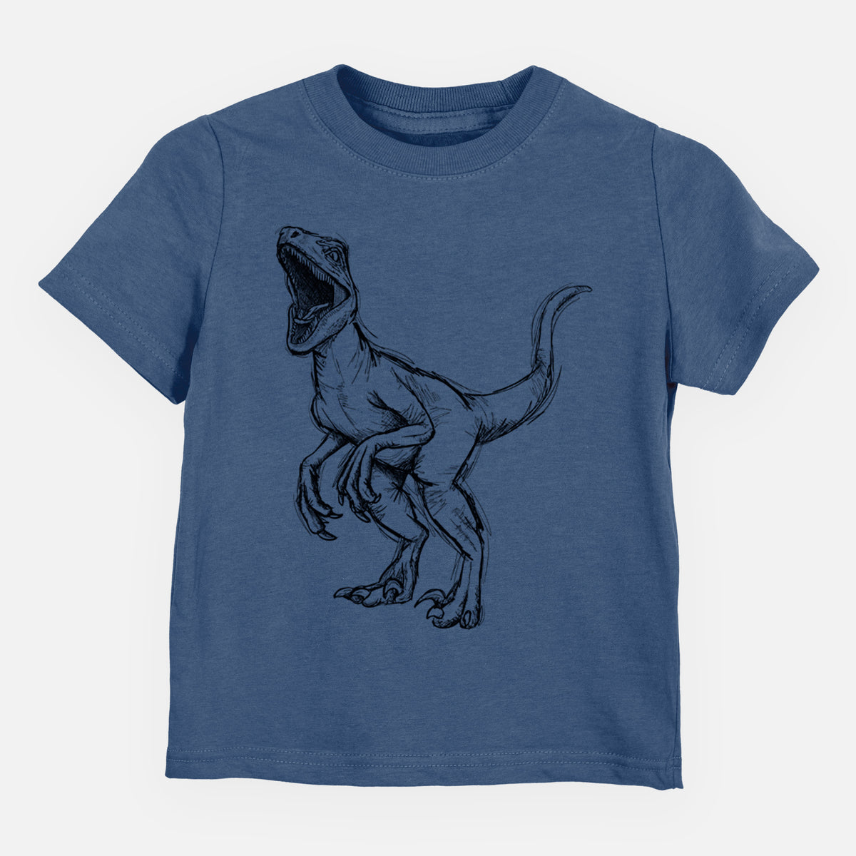 Indigo blue toddler t-shirt laid flat, printed with a black ink illustration of a Velociraptor roaring.
