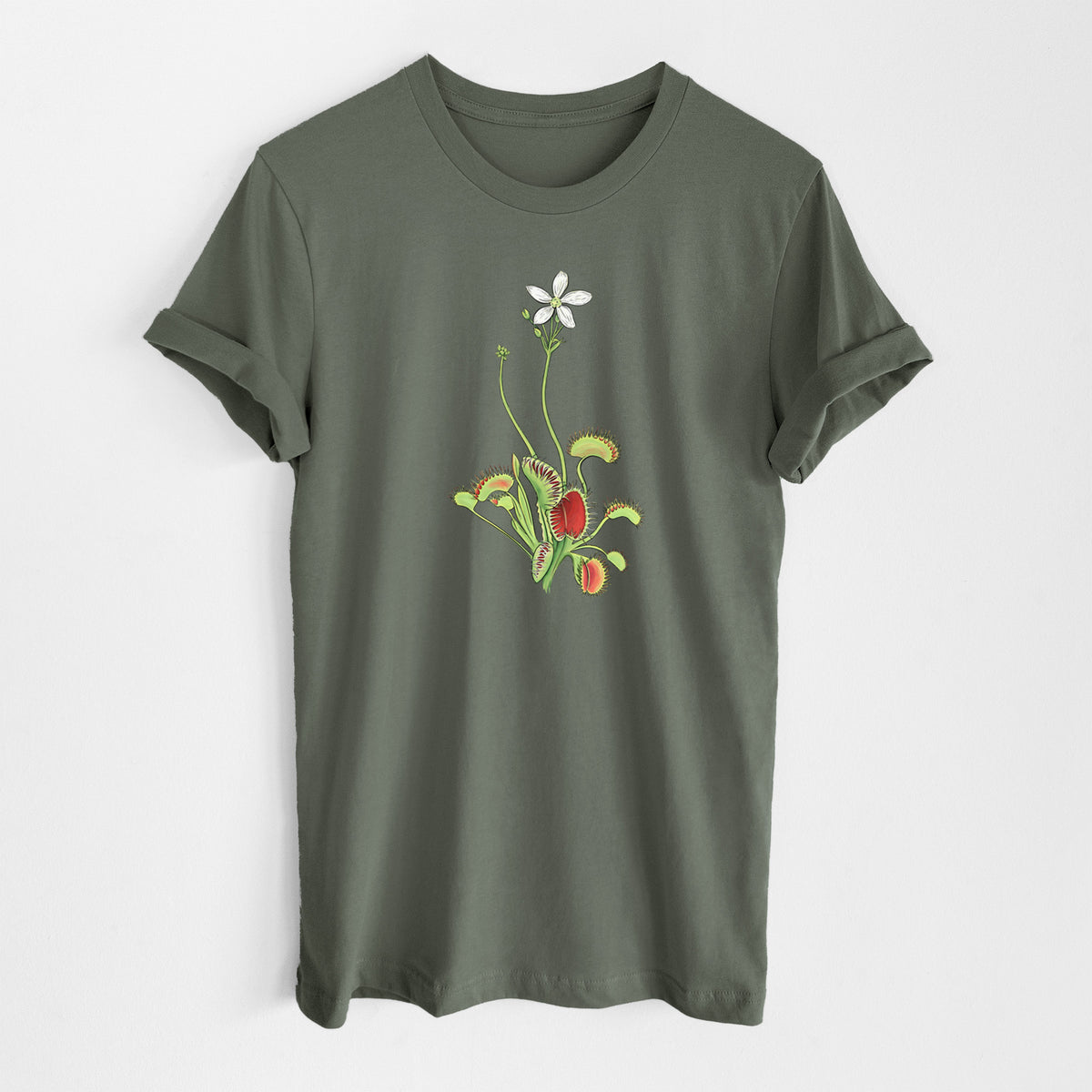 Military green lightweight cotton t-shirt laid flat, printed with a full-color illustration of a Venus flytrap plant with red traps and a small white flower.