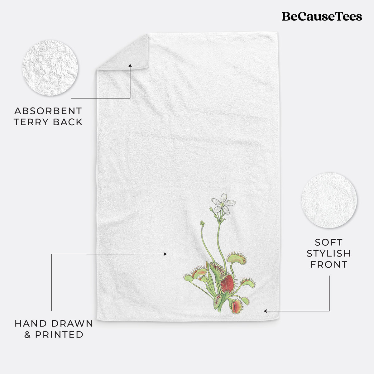 White hand towel printed with a full-color illustration of a Venus flytrap plant with red traps and a small white flower.
