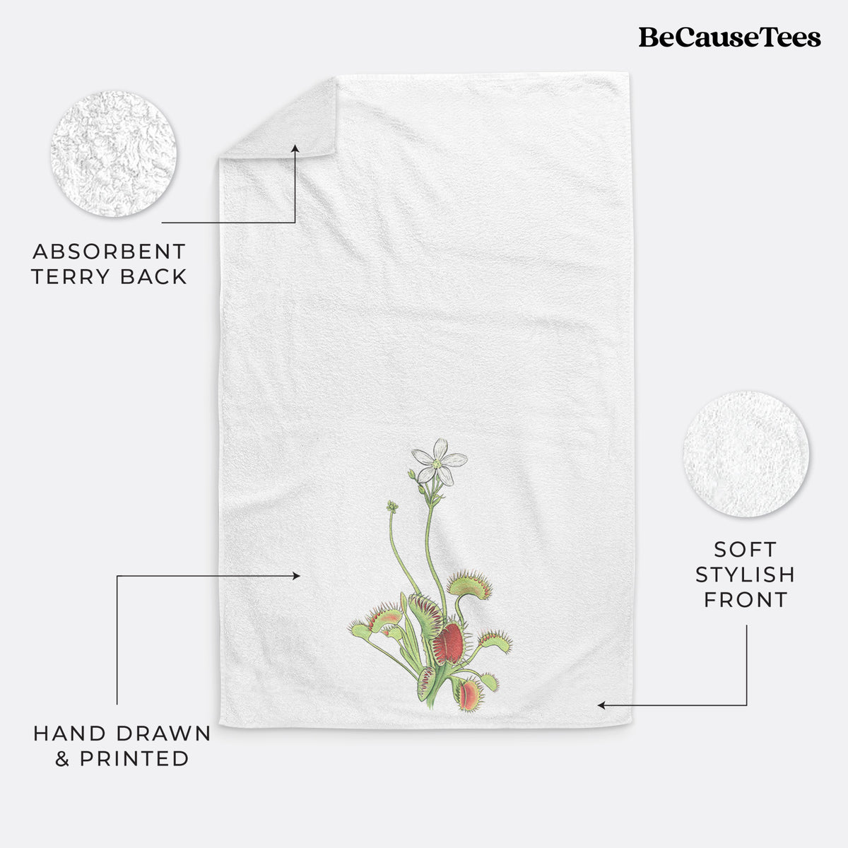 White hand towel printed with a full-color illustration of a Venus flytrap plant with red traps and a small white flower.