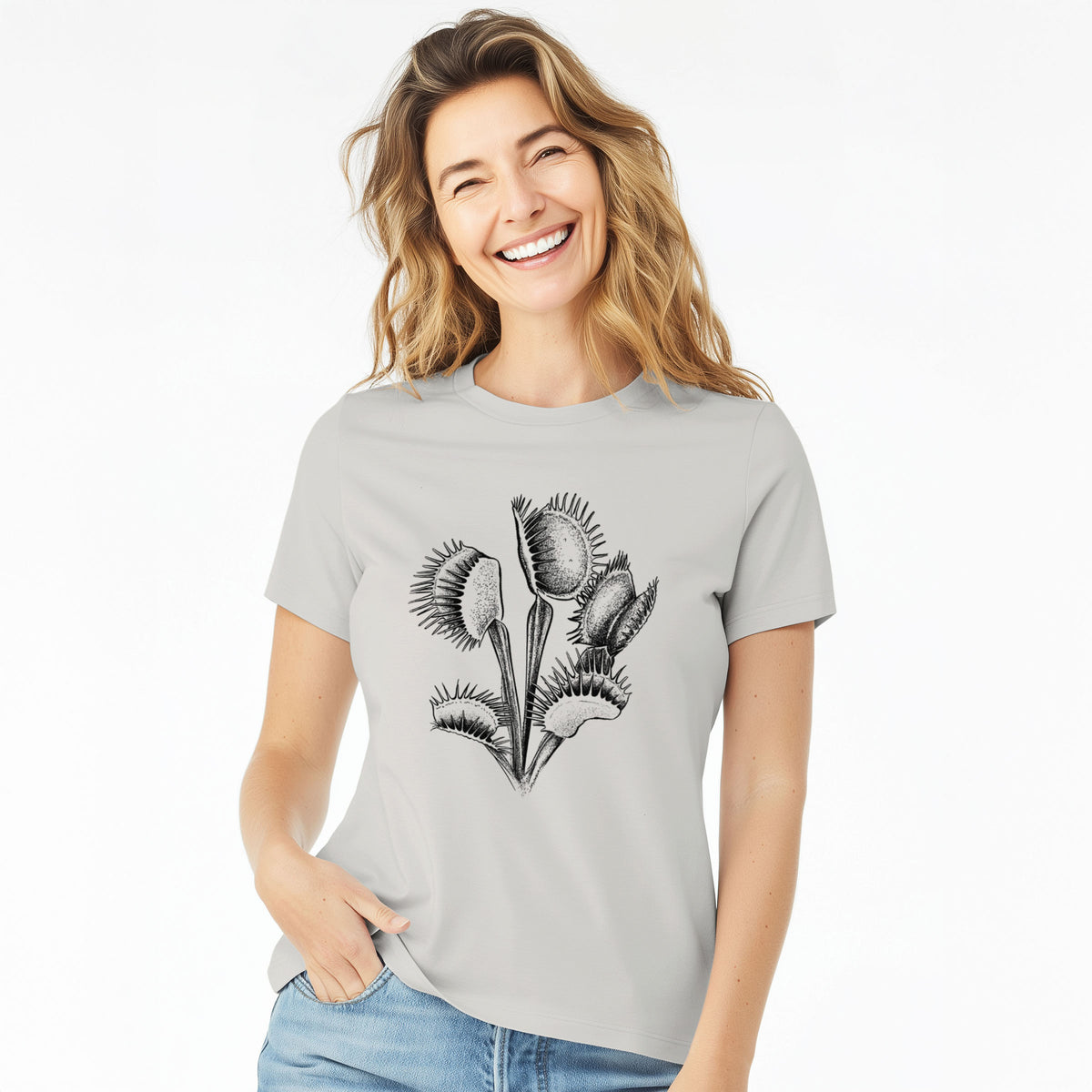 Woman wearing a lunar grey women's relaxed fit cotton t-shirt printed with a black ink illustration of a Venus flytrap plant with open traps.