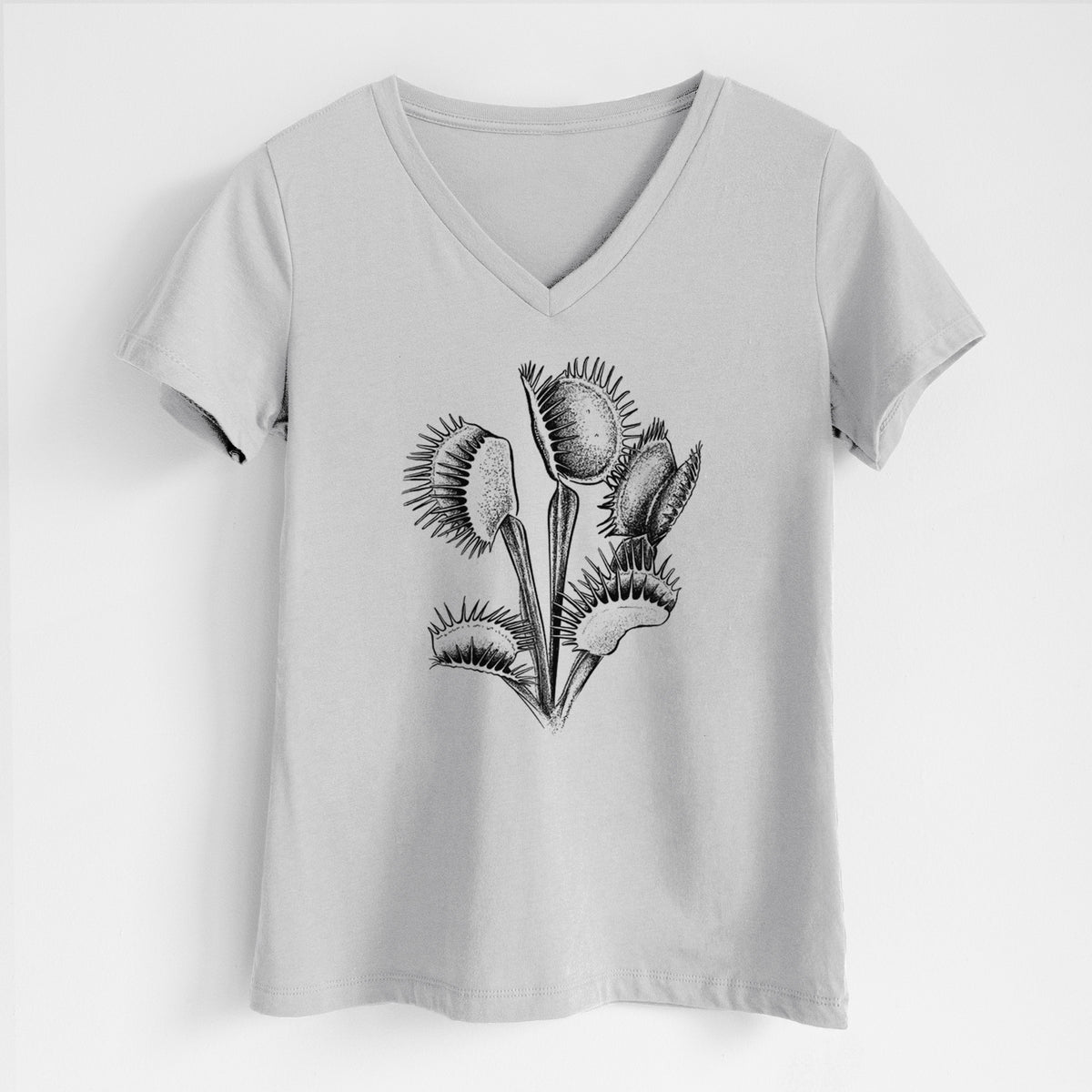 Lunar grey women's relaxed fit cotton V-neck t-shirt laid flat, printed with a black ink illustration of a Venus flytrap plant with open traps.