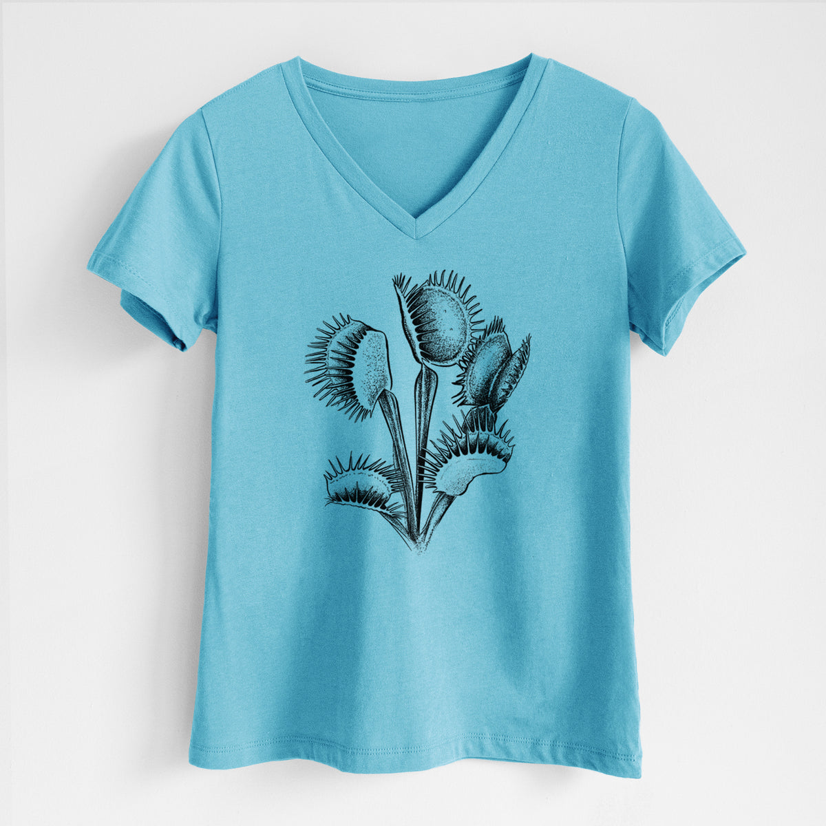 Turquoise women's relaxed fit cotton V-neck t-shirt laid flat, printed with a black ink illustration of a Venus flytrap plant with open traps.