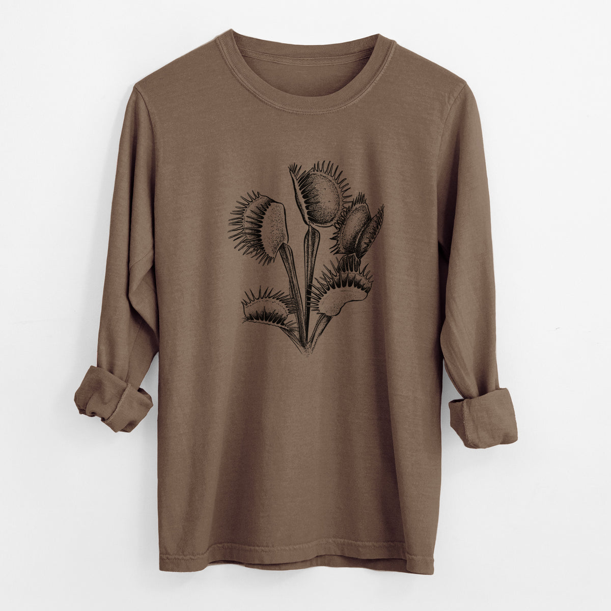 Espresso brown Comfort Colors long sleeve shirt laid flat with the cuffs rolled, printed with a black ink illustration of a Venus flytrap plant with open traps.