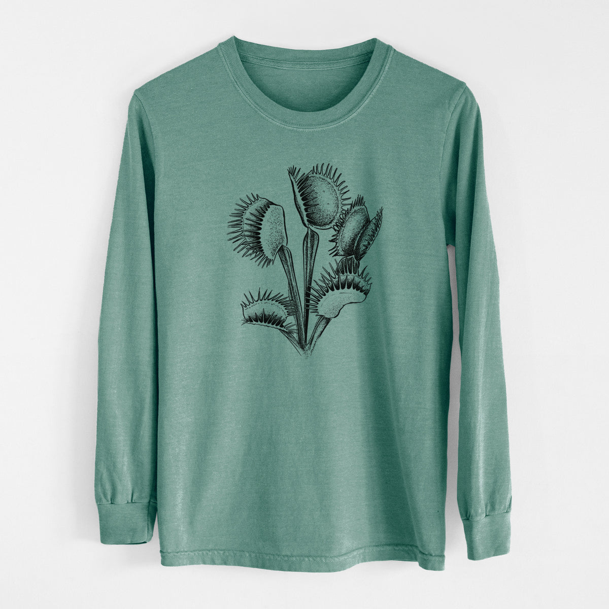 Pine green Comfort Colors long sleeve shirt laid flat, printed with a black ink illustration of a Venus flytrap plant with open traps.