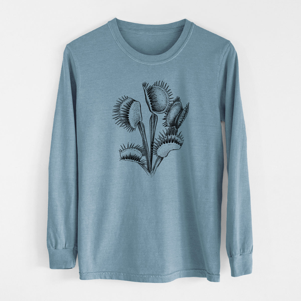 Steel blue Comfort Colors long sleeve shirt laid flat, printed with a black ink illustration of a Venus flytrap plant with open traps.