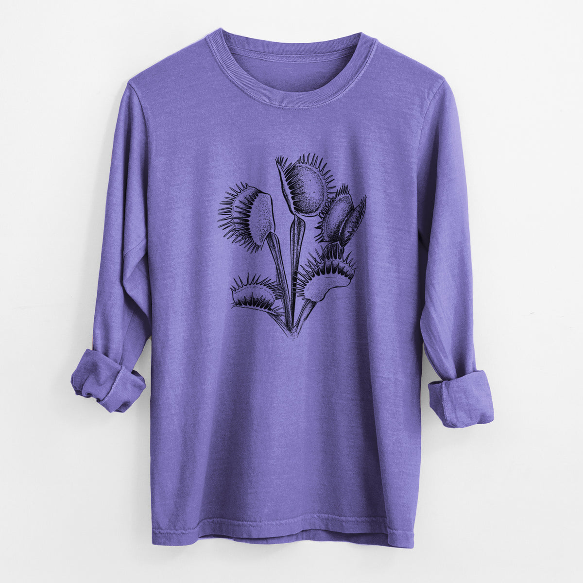 Violet purple Comfort Colors long sleeve shirt laid flat with the cuffs rolled, printed with a black ink illustration of a Venus flytrap plant with open traps.