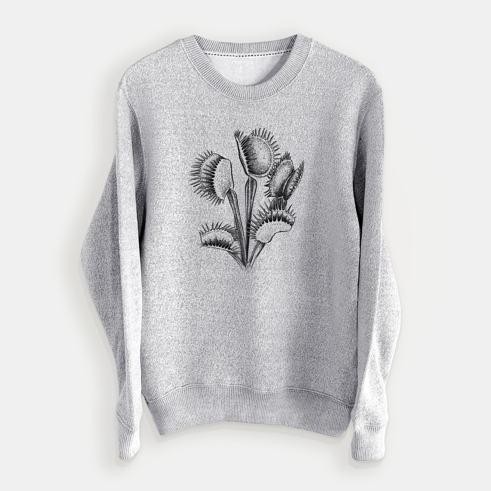 Salt and pepper knit sweatshirt laid flat, printed with a black ink illustration of a Venus flytrap plant with open traps.