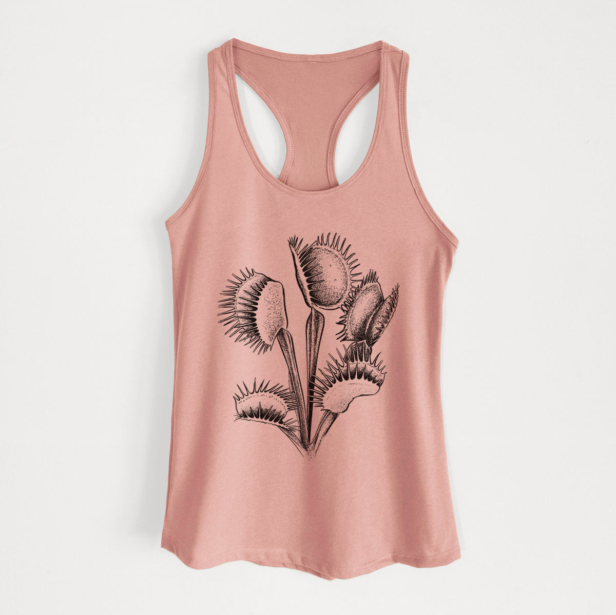 Desert pink women's racerback tank top laid flat, printed with a black ink illustration of a Venus flytrap plant with open traps.