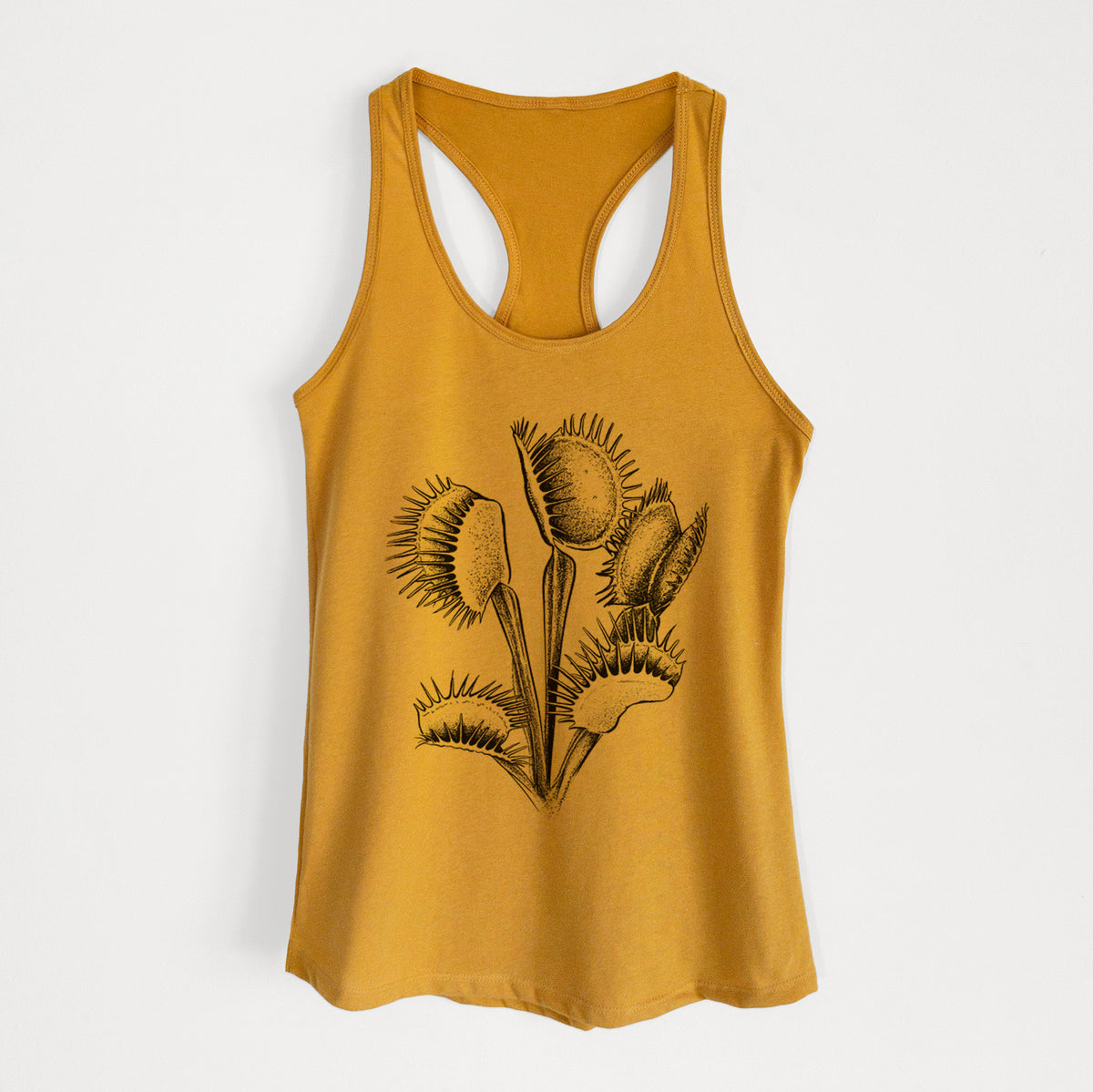 Gold women's racerback tank top laid flat, printed with a black ink illustration of a Venus flytrap plant with open traps.