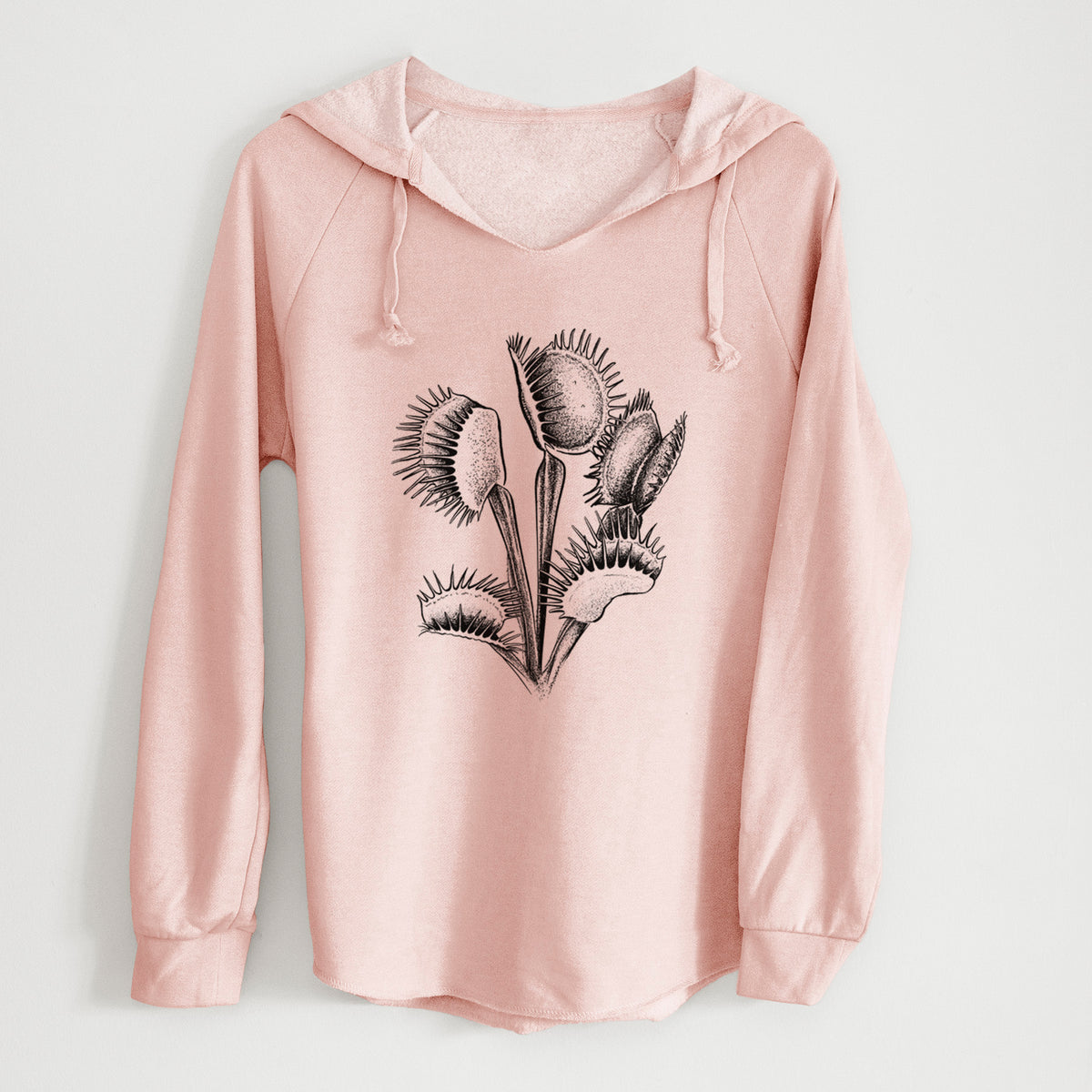 Blush pink women's Cali Wave hooded sweatshirt laid flat, printed with a black ink illustration of a Venus flytrap plant with open traps.