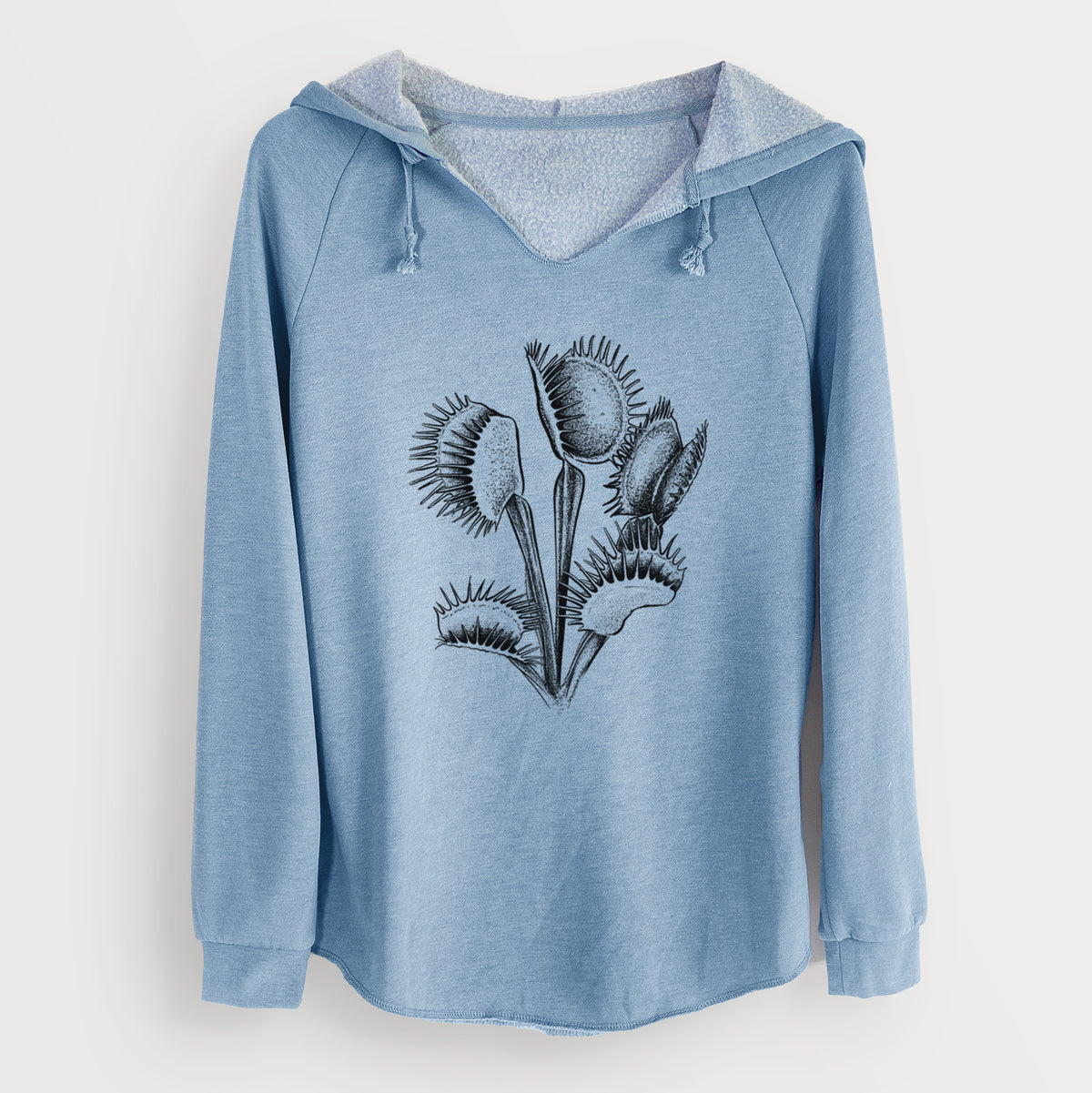 Misty blue women's Cali Wave hooded sweatshirt laid flat, printed with a black ink illustration of a Venus flytrap plant with open traps.