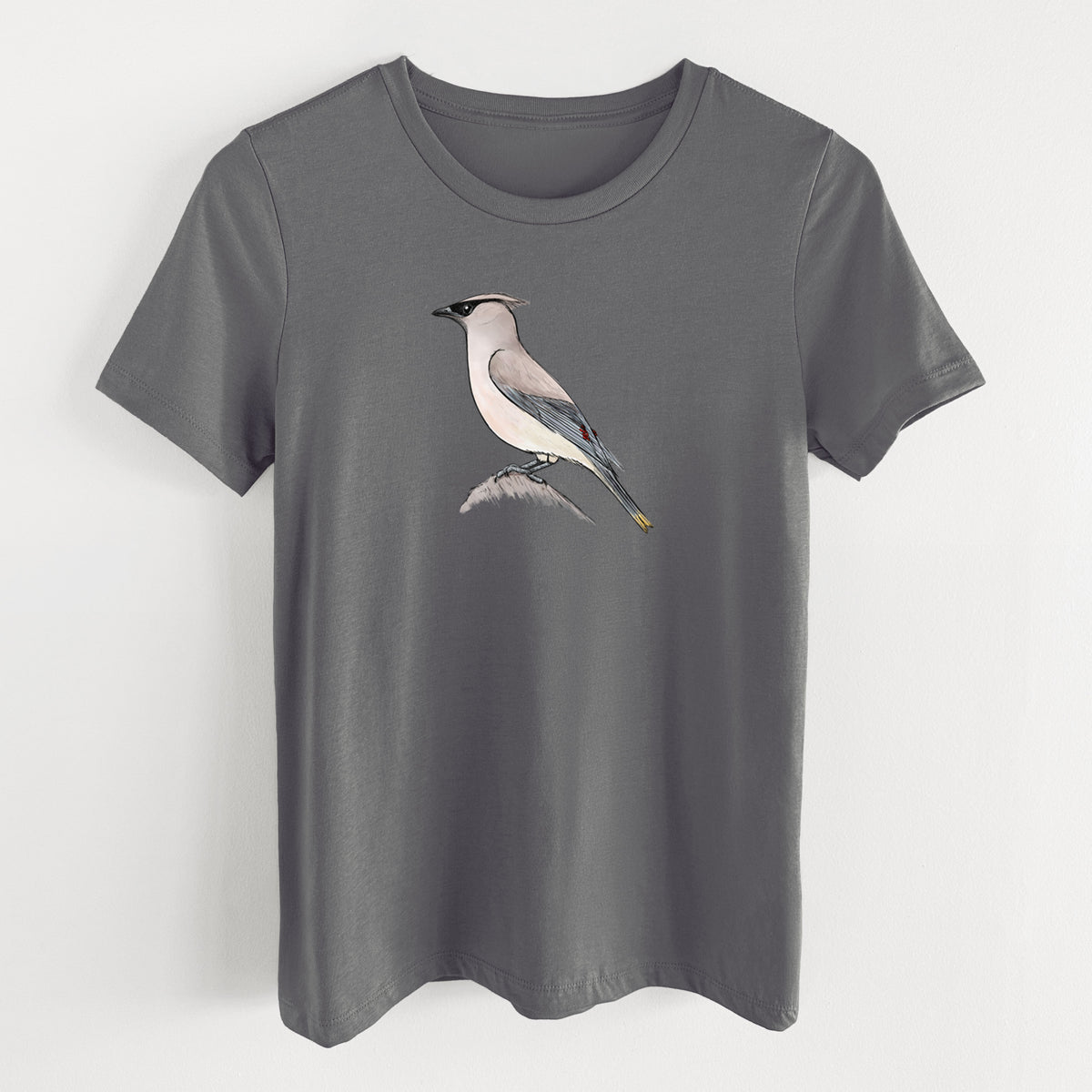 Asphalt women's relaxed fit cotton t-shirt laid flat, printed with a full-color illustration of a cedar waxwing perched on a branch.