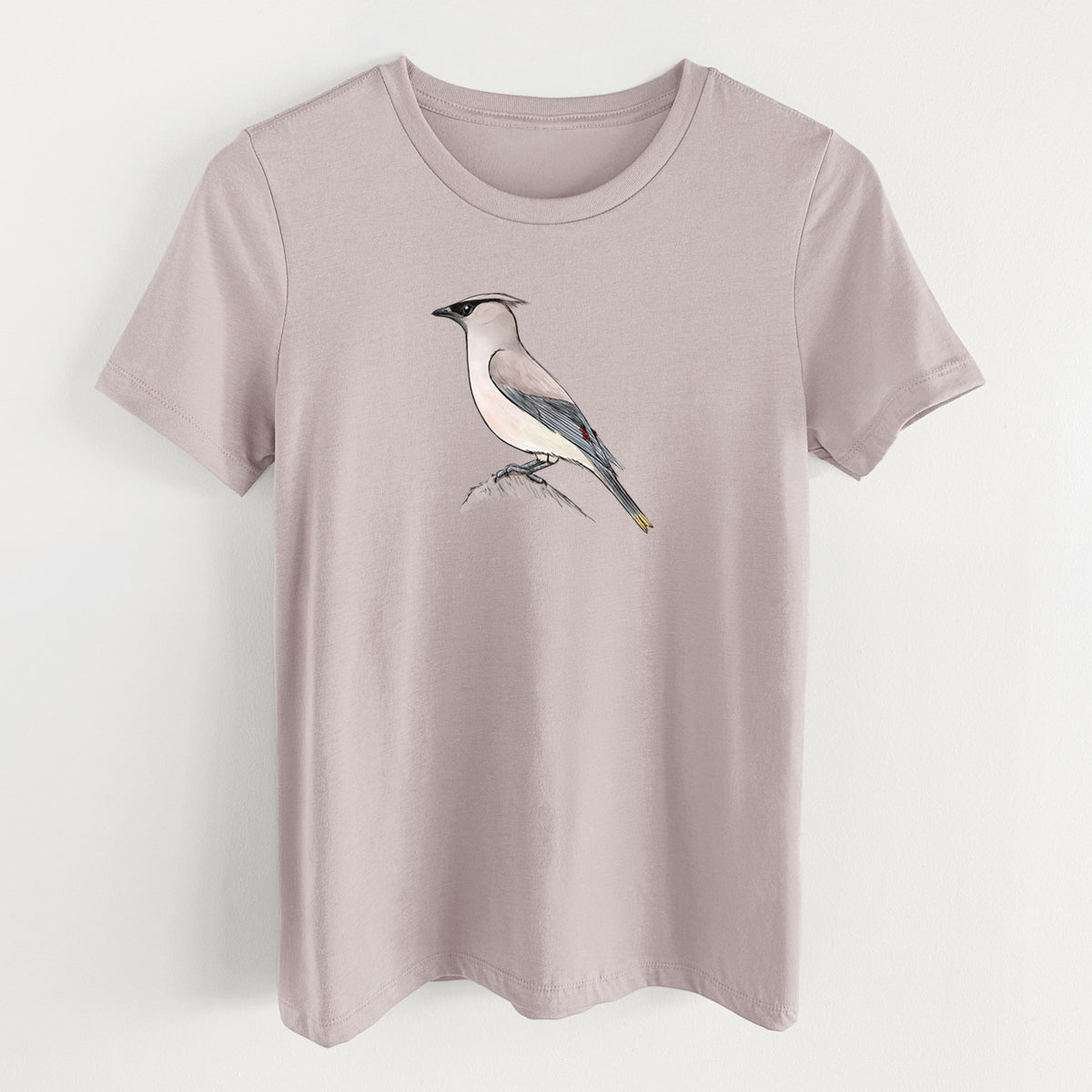 Pink gravel women's relaxed fit cotton t-shirt laid flat, printed with a full-color illustration of a cedar waxwing perched on a branch.