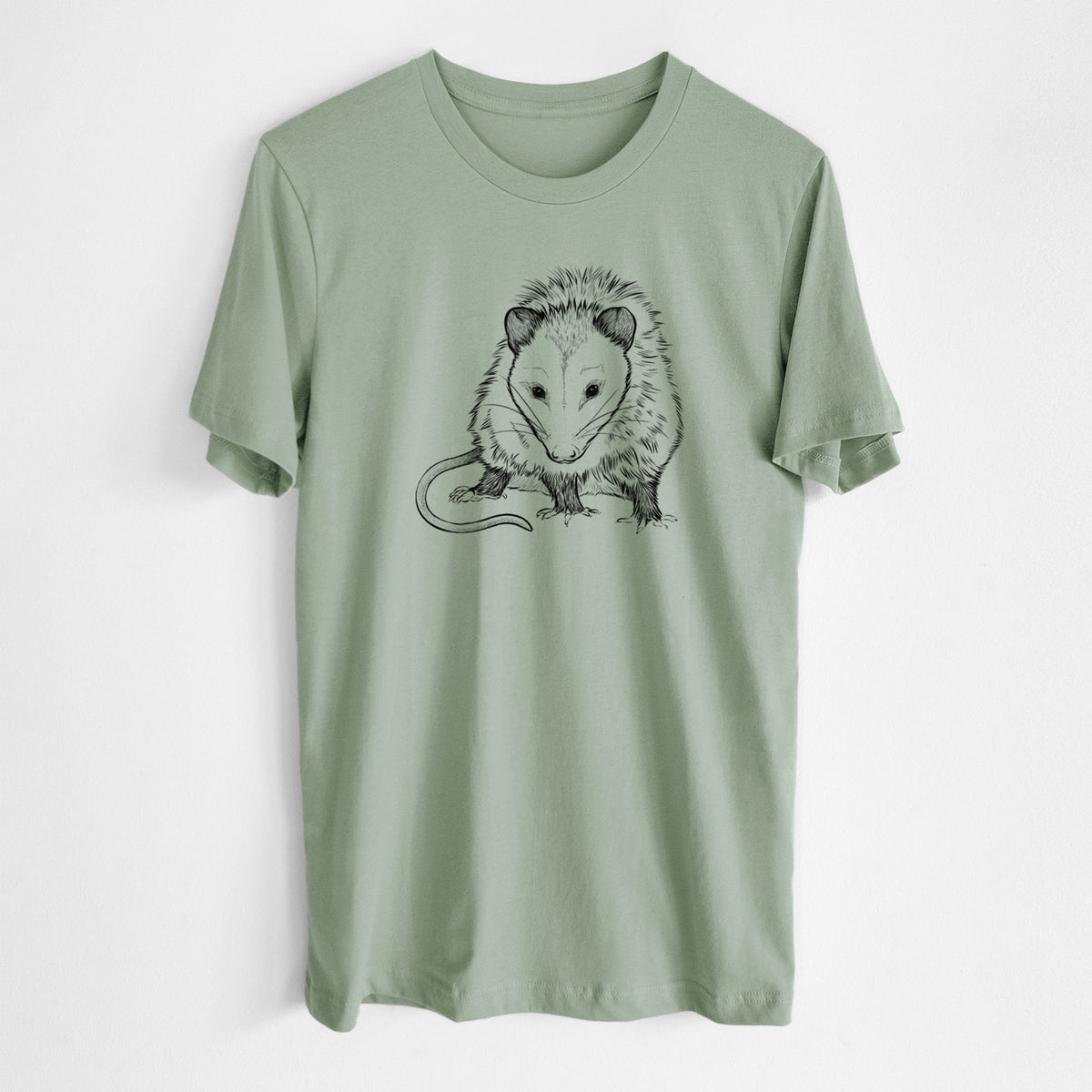 Sage green lightweight cotton t-shirt laid flat, printed with a detailed black ink illustration of a Virginia opossum standing with its long tail curled.