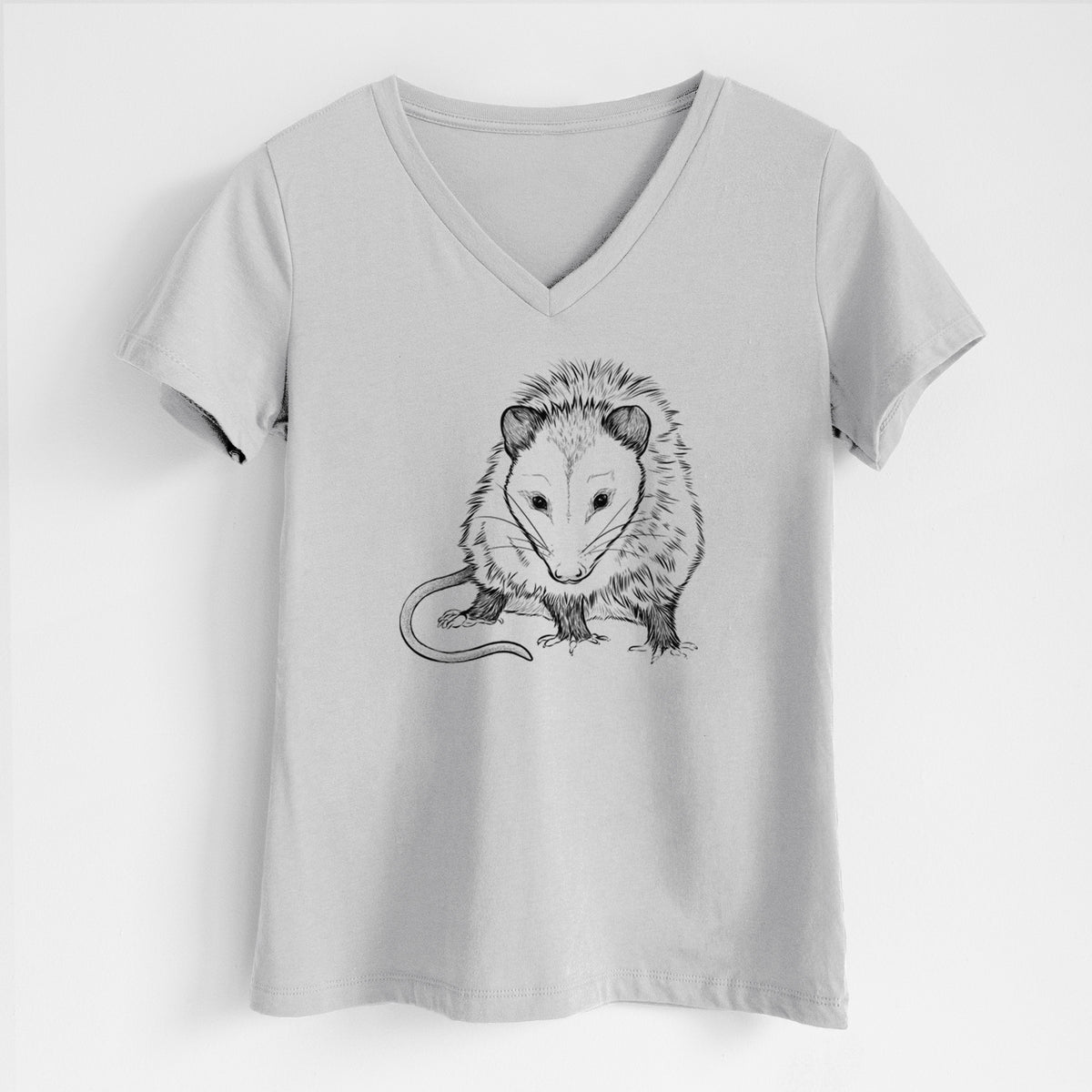 Lunar grey women's relaxed fit cotton V-neck t-shirt laid flat, printed with a detailed black ink illustration of a Virginia opossum standing with its long tail curled.
