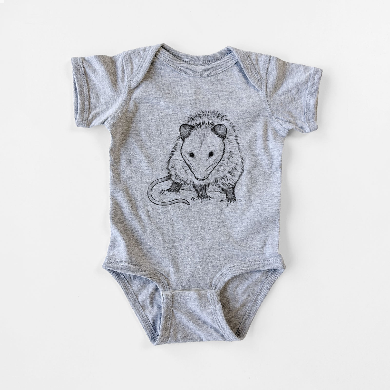 Grey baby bodysuit laid flat, printed with a detailed black ink illustration of a Virginia opossum standing with its long tail curled.