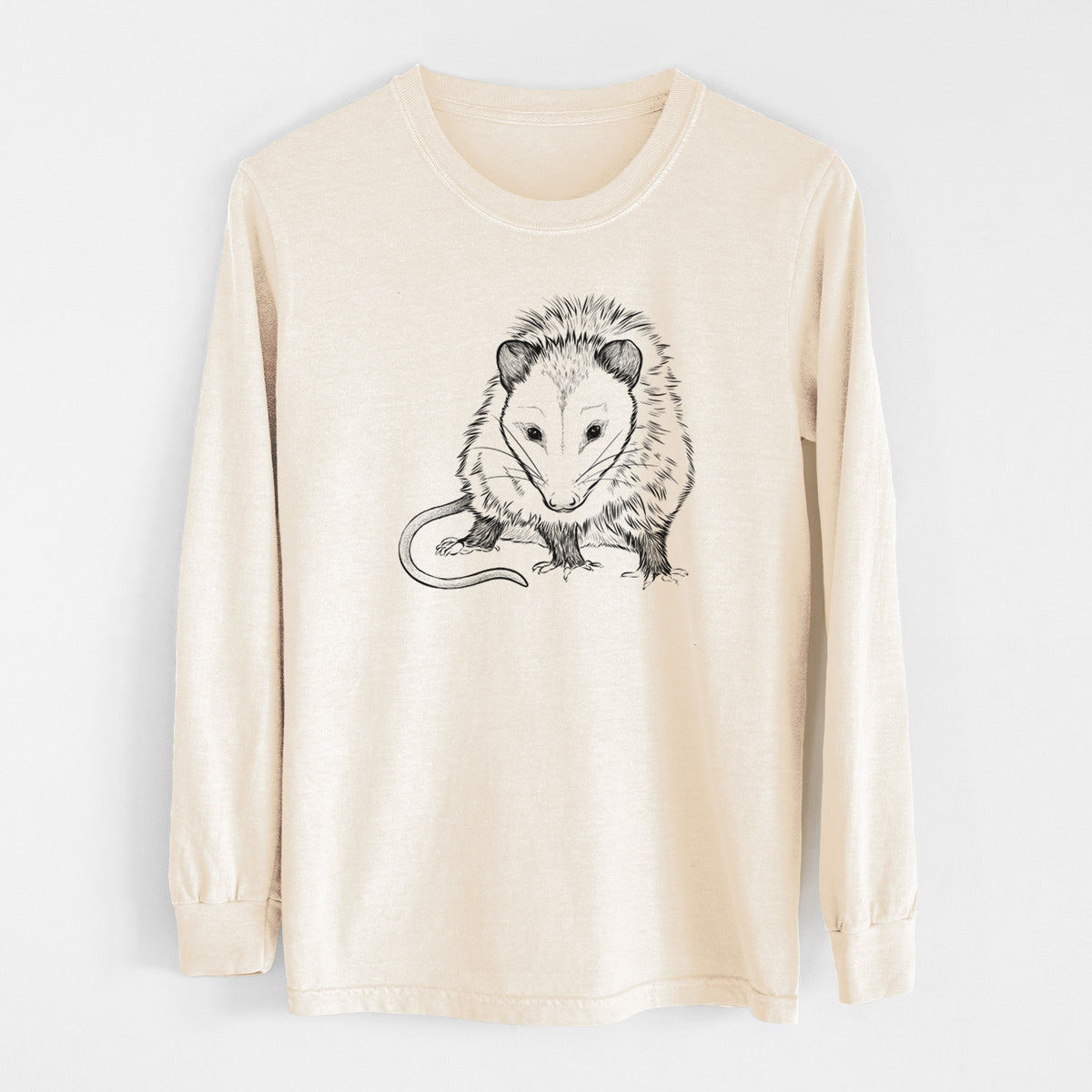 Ivory Comfort Colors long sleeve shirt laid flat, printed with a detailed black ink illustration of a Virginia opossum standing with its long tail curled.