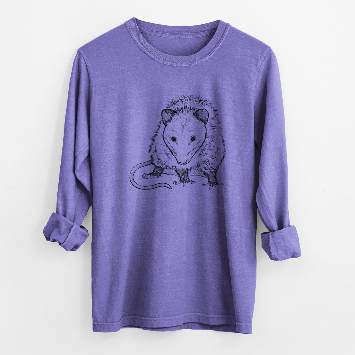 Violet purple Comfort Colors long sleeve shirt laid flat with the cuffs rolled, printed with a detailed black ink illustration of a Virginia opossum standing with its long tail curled.
