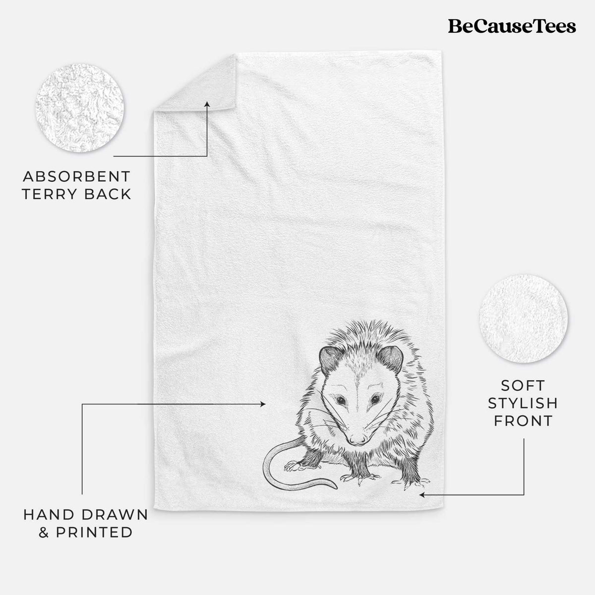 White hand towel printed with a detailed black ink illustration of a Virginia opossum standing with its long tail curled.