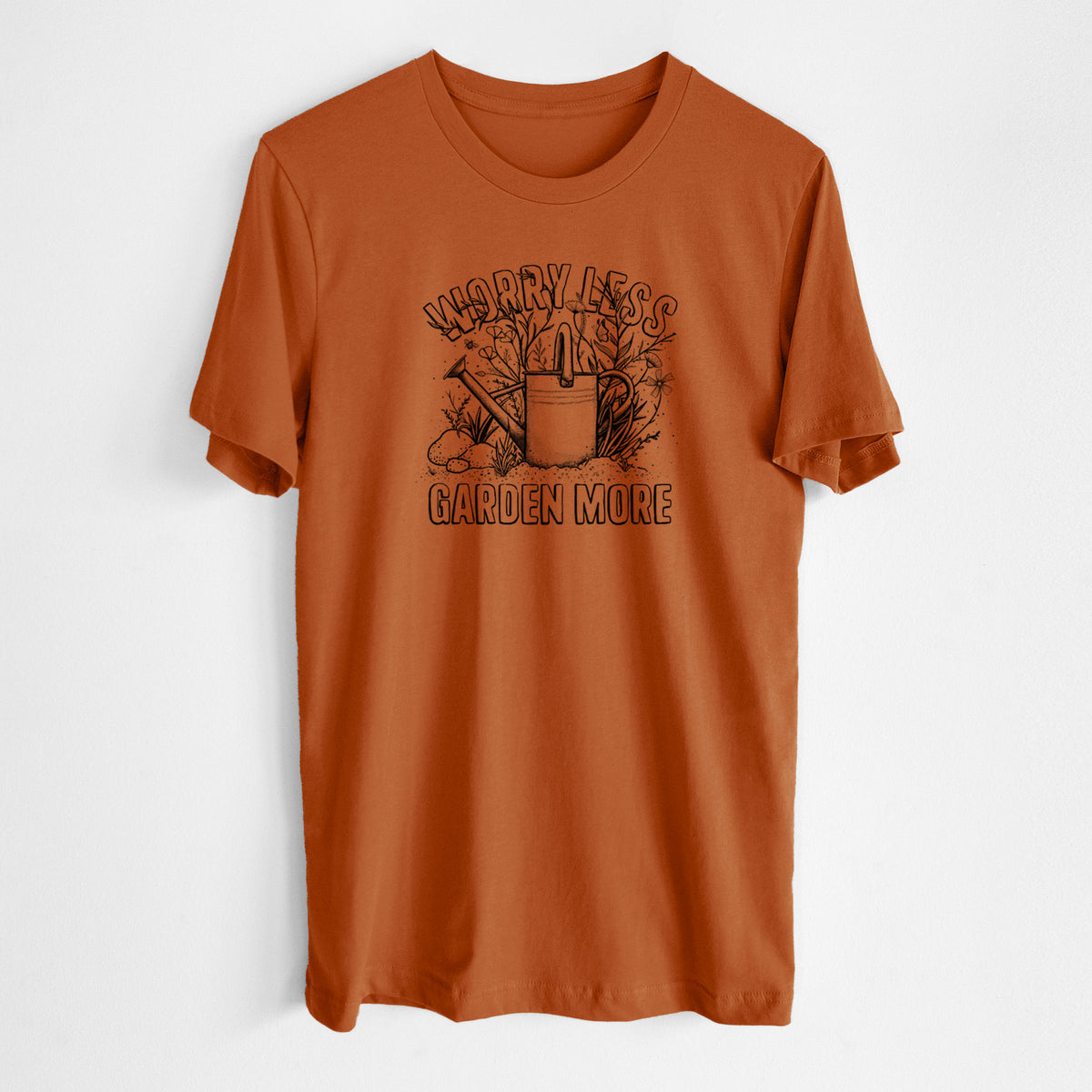Autumn lightweight cotton t-shirt laid flat, printed with a black ink watering can surrounded by flowers and garden tools, with the words Worry Less, Garden More.