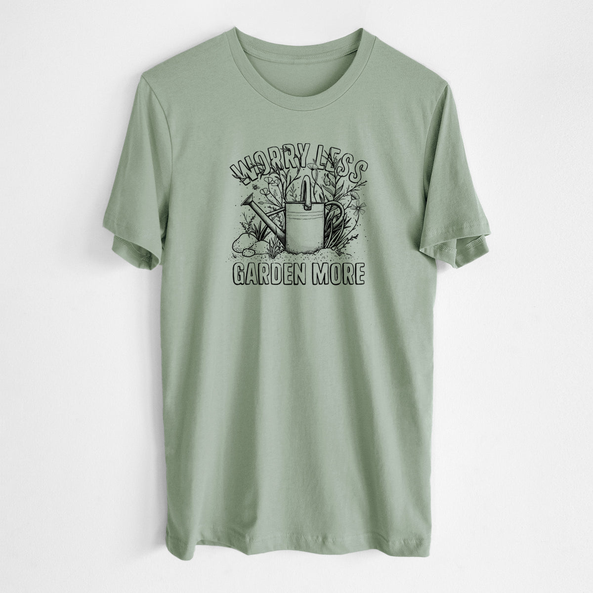 Sage green lightweight cotton t-shirt laid flat, printed with a black ink watering can surrounded by flowers and garden tools, with the words Worry Less, Garden More.