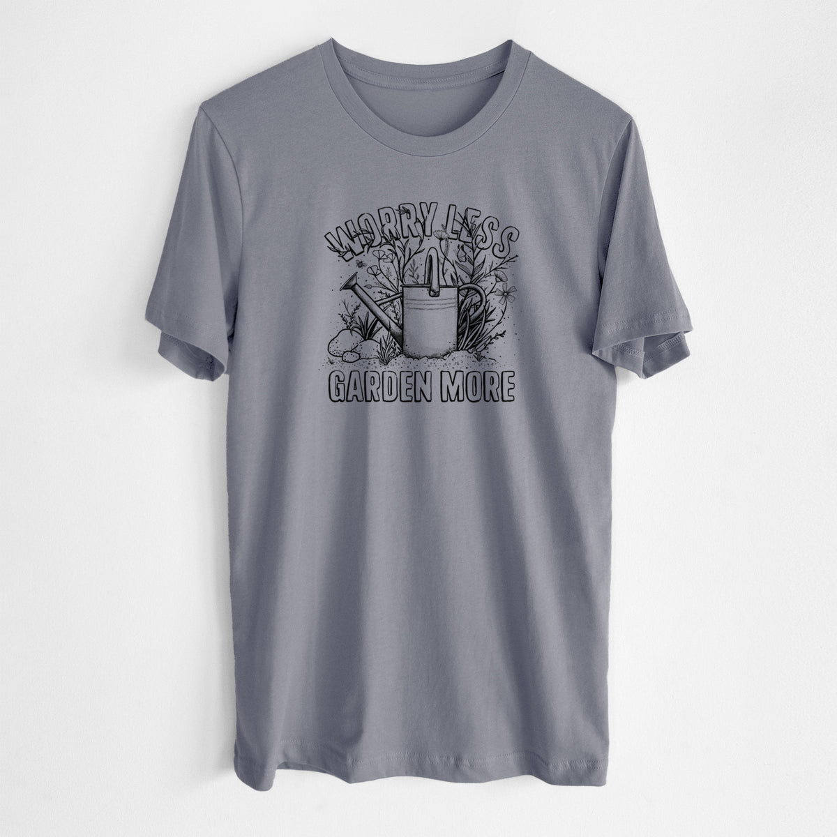 Storm grey lightweight cotton t-shirt laid flat, printed with a black ink watering can surrounded by flowers and garden tools, with the words Worry Less, Garden More.