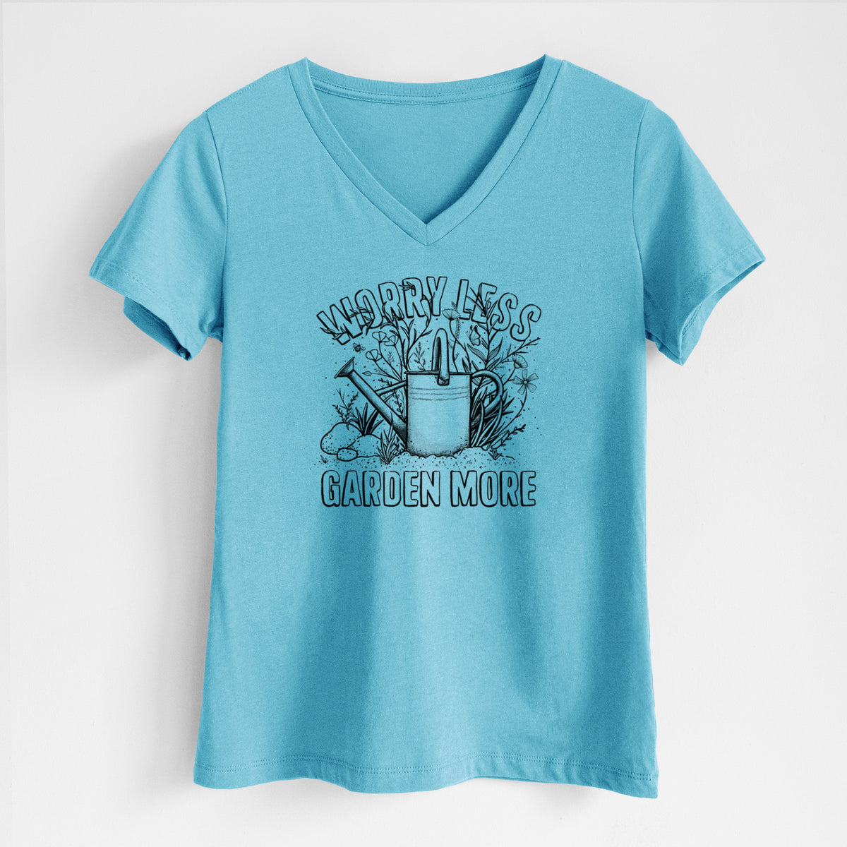 Turquoise women's relaxed fit cotton V-neck t-shirt laid flat, printed with a black ink watering can surrounded by flowers and garden tools, with the words Worry Less, Garden More.