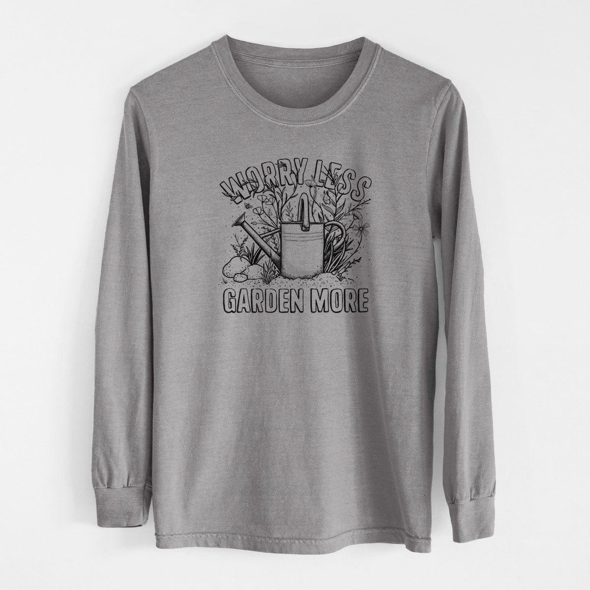 Grey Comfort Colors long sleeve shirt laid flat, printed with a black ink watering can surrounded by flowers and garden tools, with the words Worry Less, Garden More.
