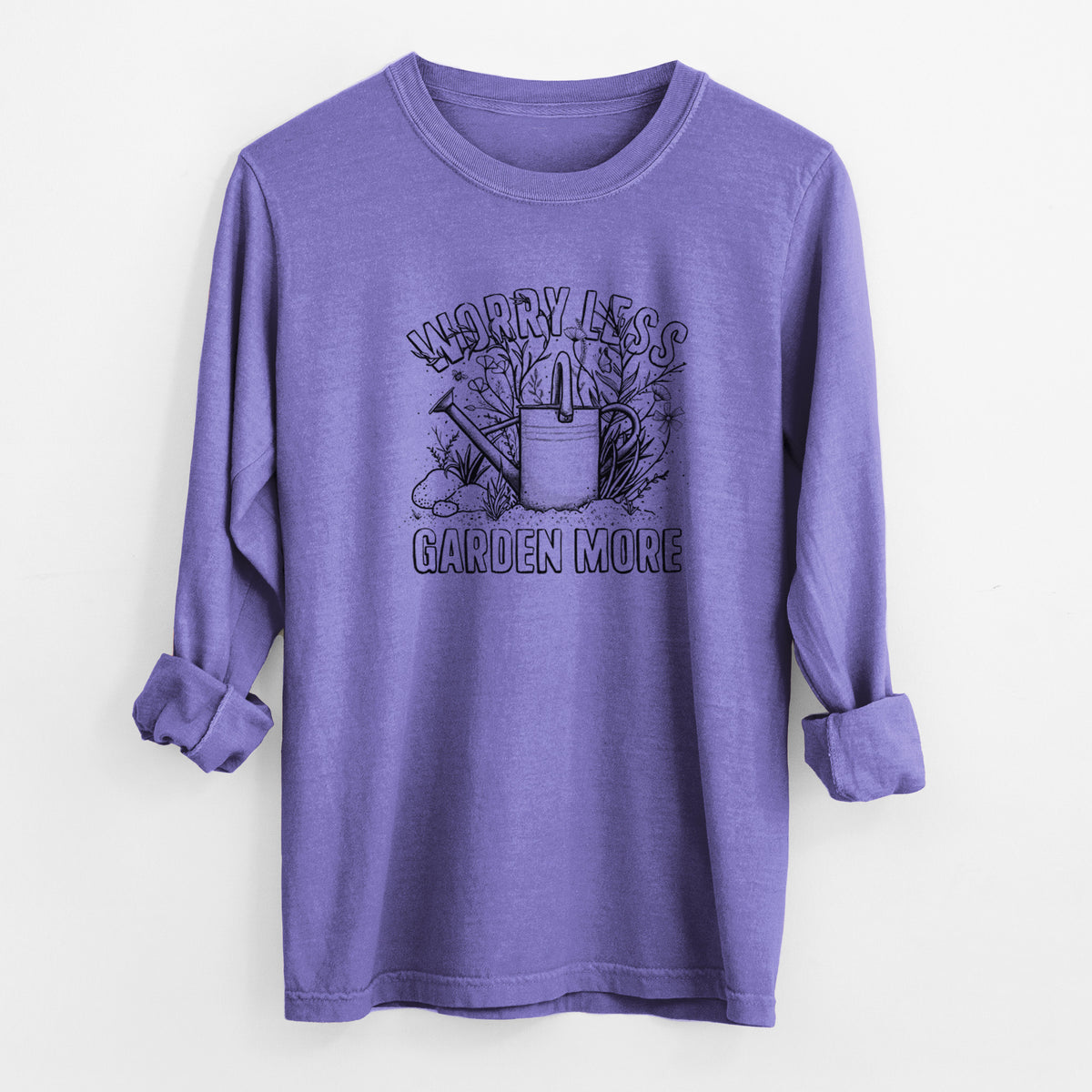Violet purple Comfort Colors long sleeve shirt laid flat with the cuffs rolled, printed with a black ink watering can surrounded by flowers and garden tools, with the words Worry Less, Garden More.