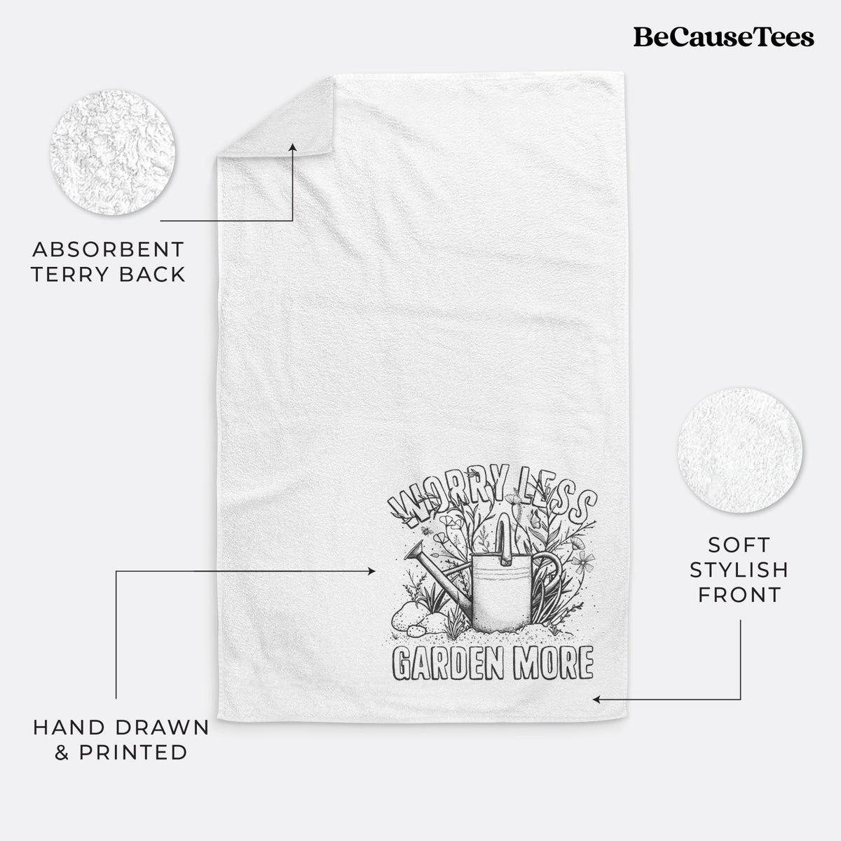 White hand towel printed with a black ink watering can surrounded by flowers and garden tools, with the words Worry Less, Garden More.