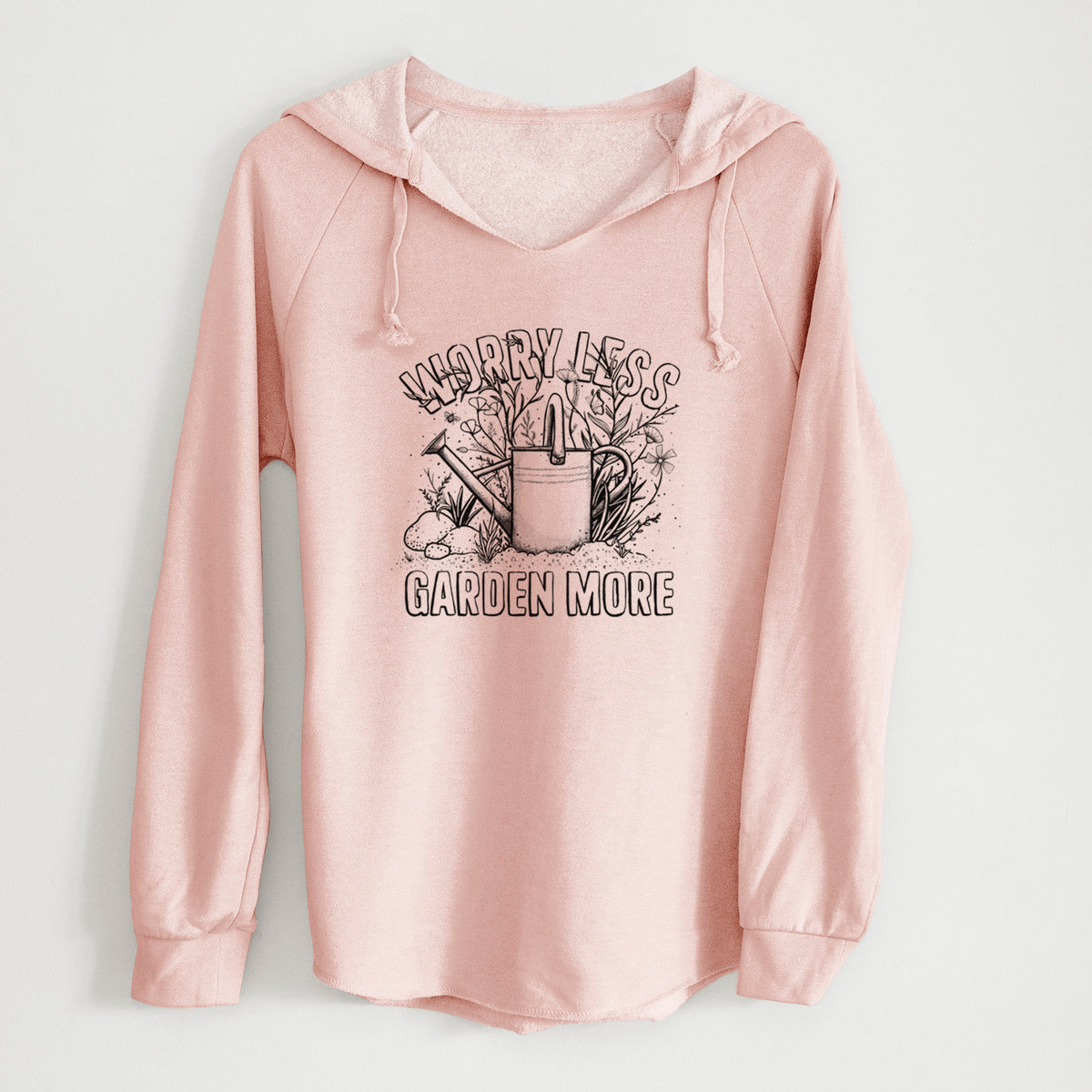 Blush pink women's Cali Wave hooded sweatshirt laid flat, printed with a black ink watering can surrounded by flowers and garden tools, with the words Worry Less, Garden More.