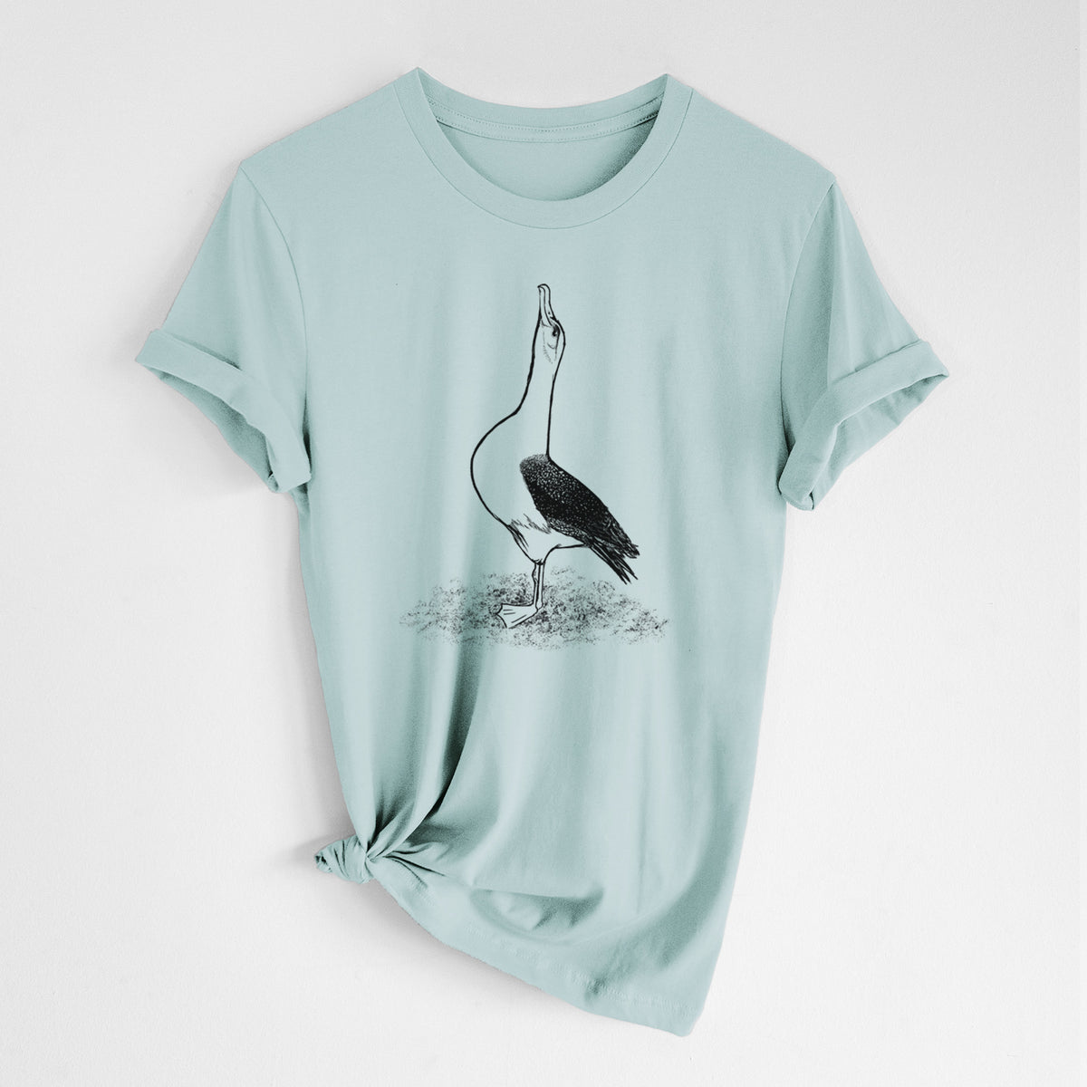 Dusty blue lightweight cotton t-shirt laid flat with the sleeves rolled, printed with a black ink illustration of a wandering albatross with its head raised.