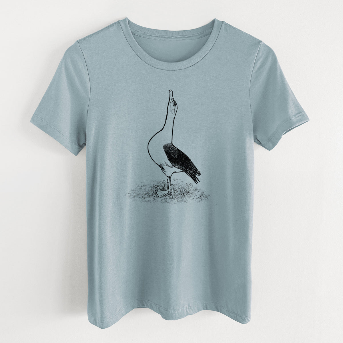 Vintage denim women's relaxed fit cotton t-shirt laid flat, printed with a black ink illustration of a wandering albatross with its head raised.