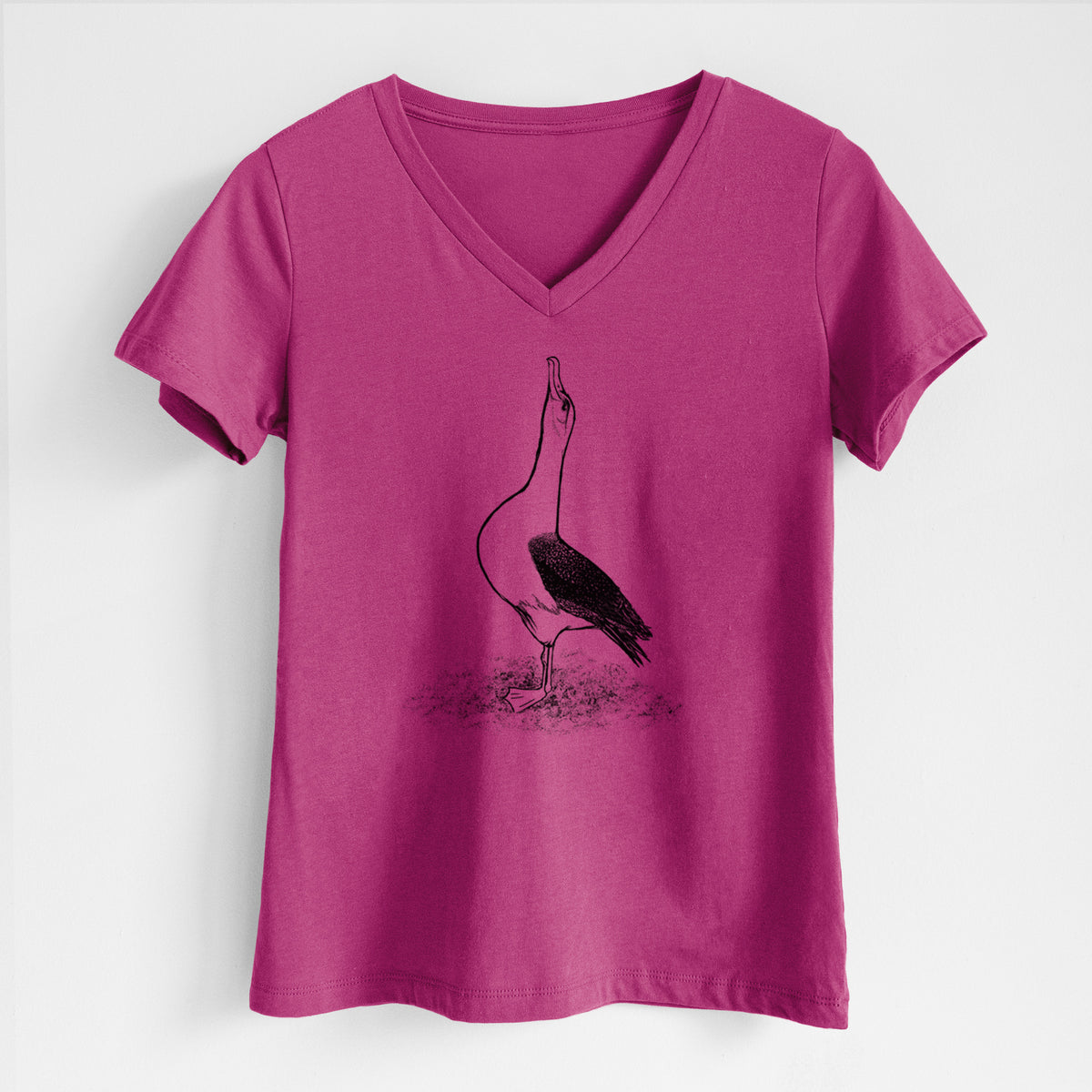 Berry pink women's relaxed fit cotton V-neck t-shirt laid flat, printed with a black ink illustration of a wandering albatross with its head raised.