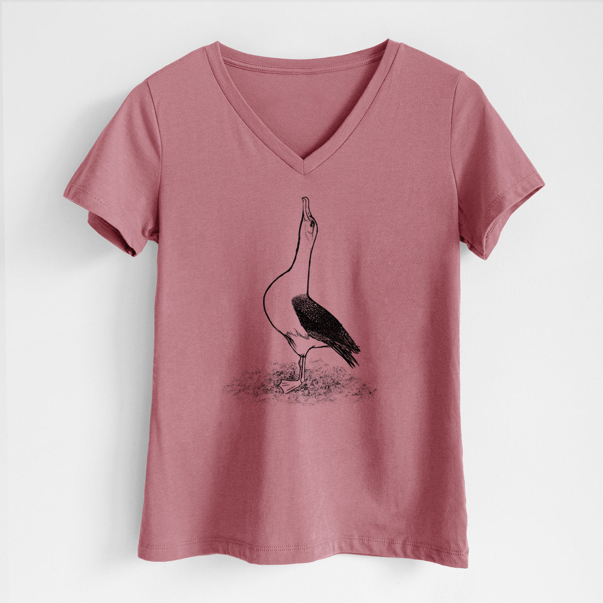 Mauve pink women's relaxed fit cotton V-neck t-shirt laid flat, printed with a black ink illustration of a wandering albatross with its head raised.