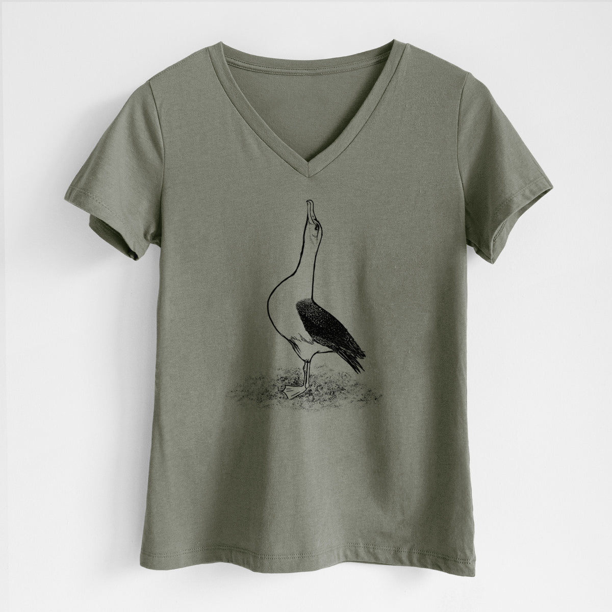 Military green women's relaxed fit cotton V-neck t-shirt laid flat, printed with a black ink illustration of a wandering albatross with its head raised.