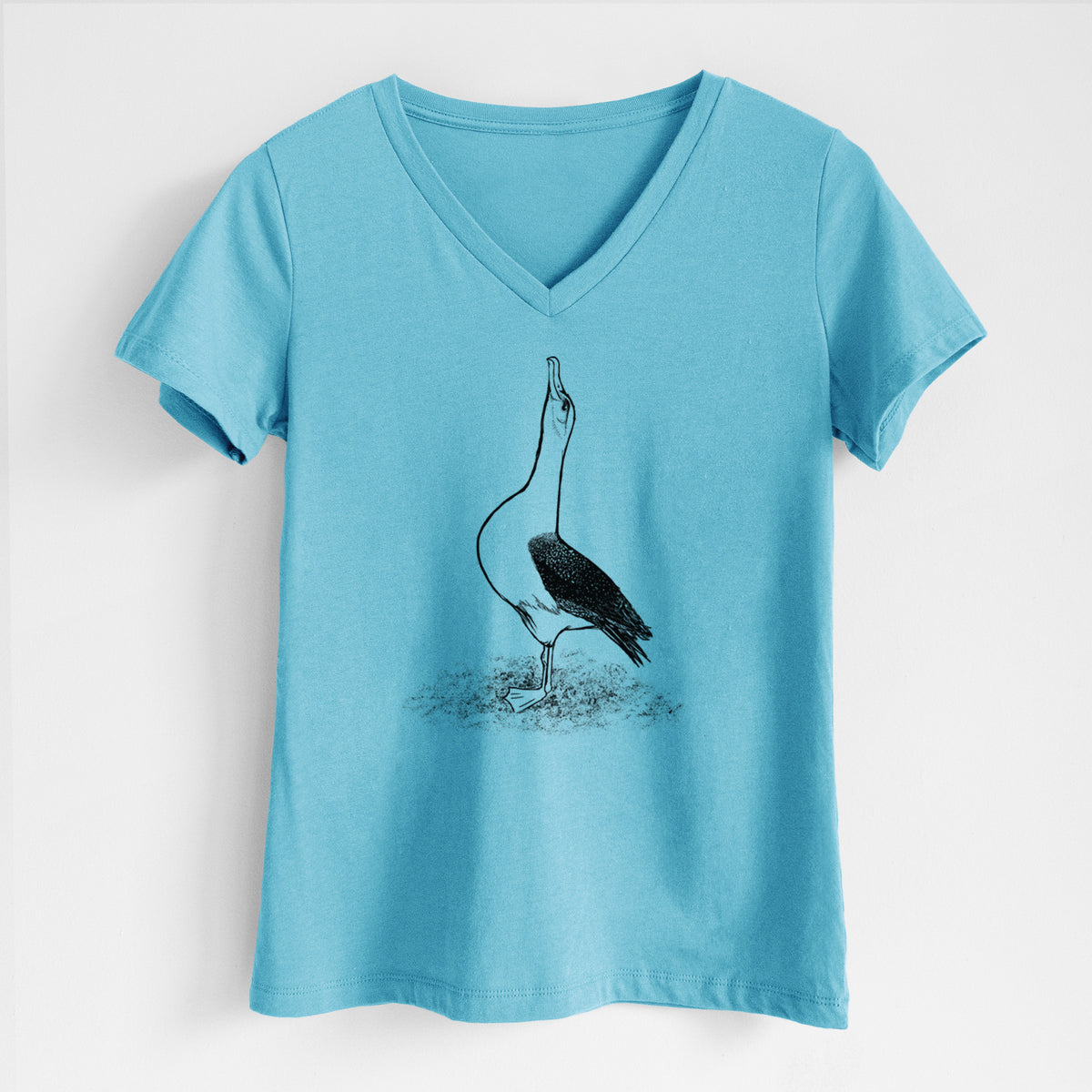 Turquoise women's relaxed fit cotton V-neck t-shirt laid flat, printed with a black ink illustration of a wandering albatross with its head raised.