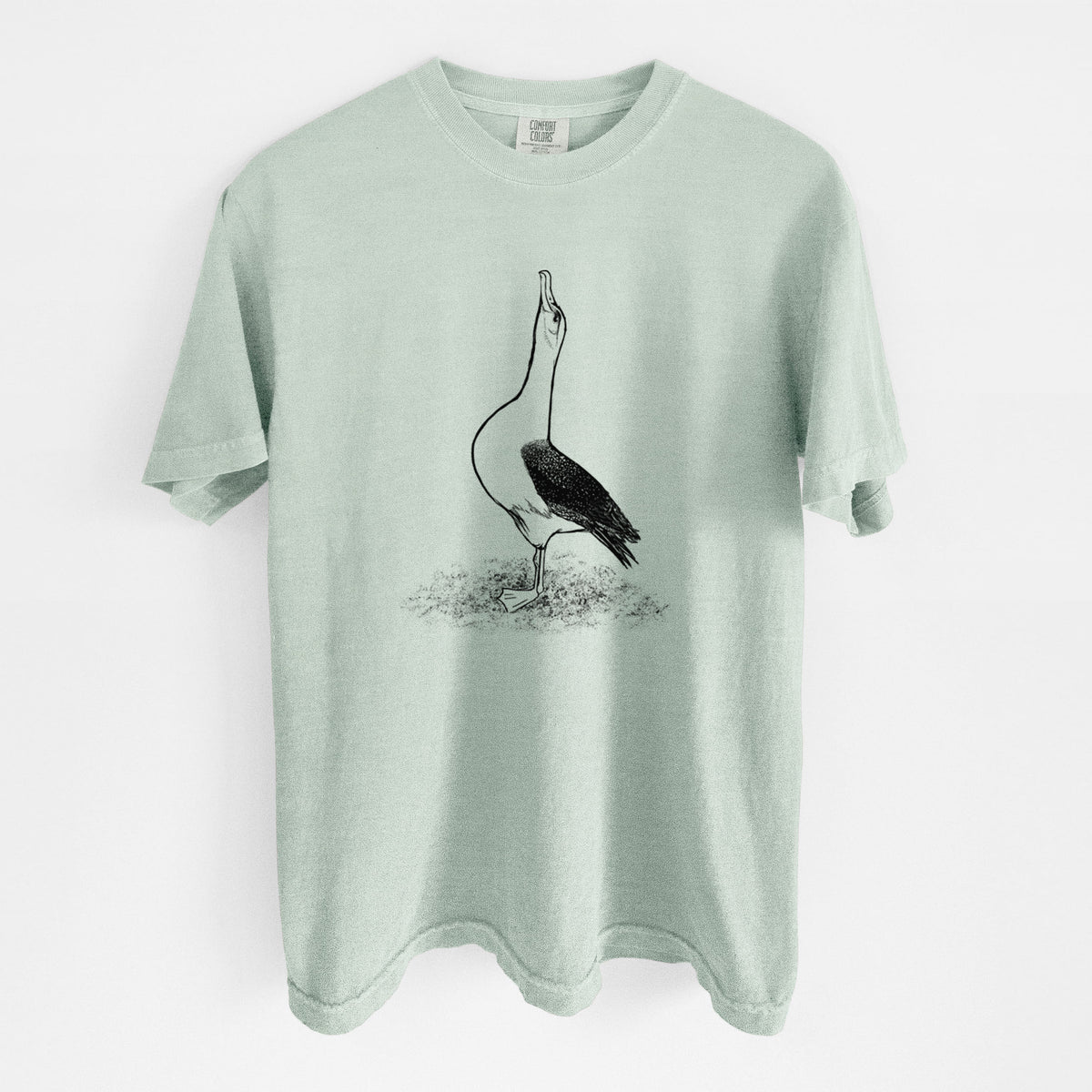 Bay green Comfort Colors t-shirt laid flat, printed with a black ink illustration of a wandering albatross with its head raised.