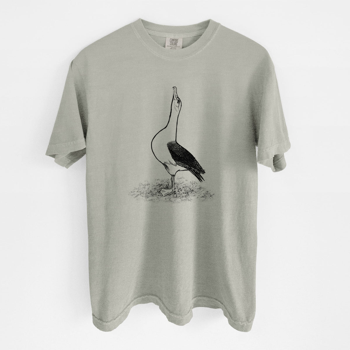 Sandstone beige Comfort Colors t-shirt laid flat, printed with a black ink illustration of a wandering albatross with its head raised.