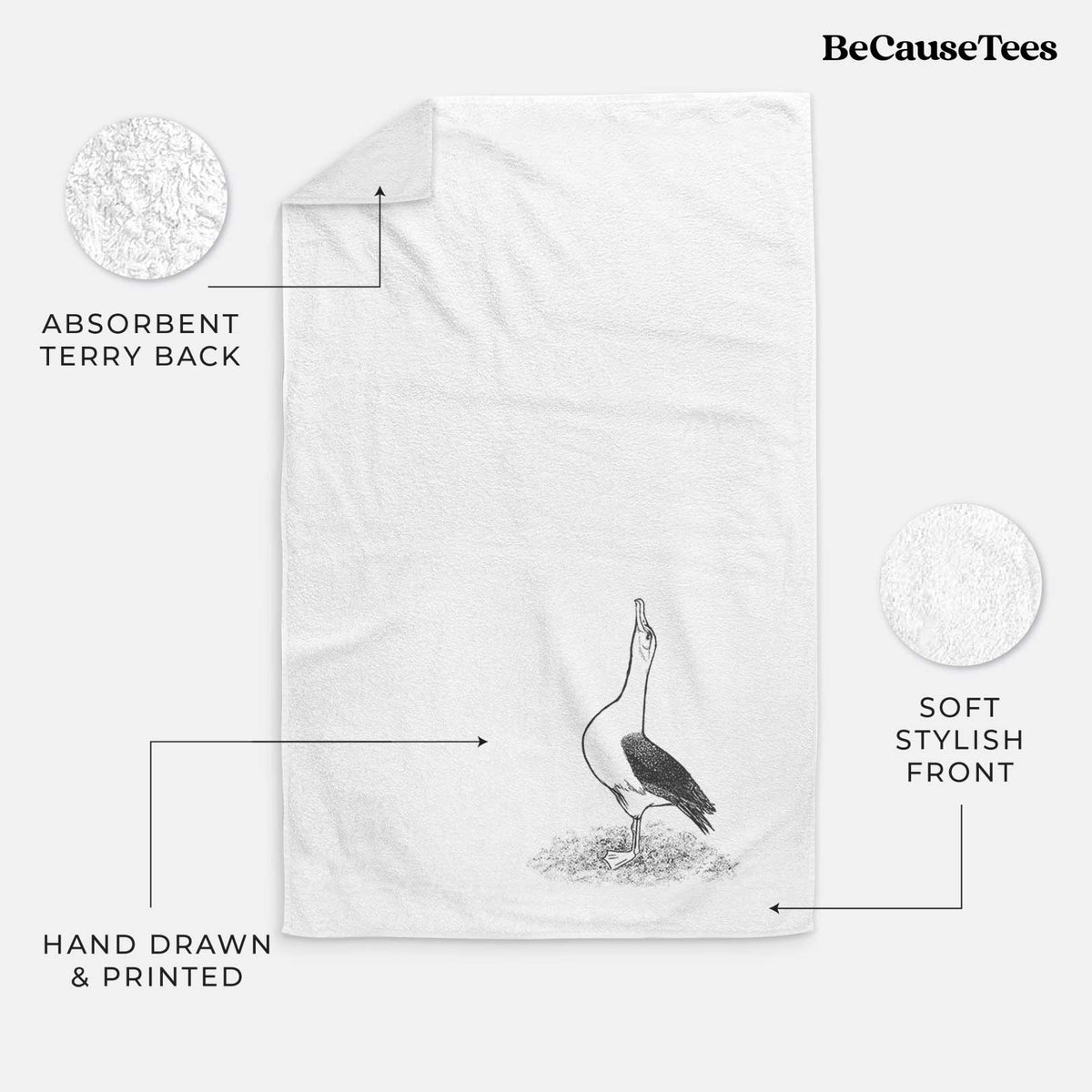 White hand towel printed with a black ink illustration of a wandering albatross with its head raised.