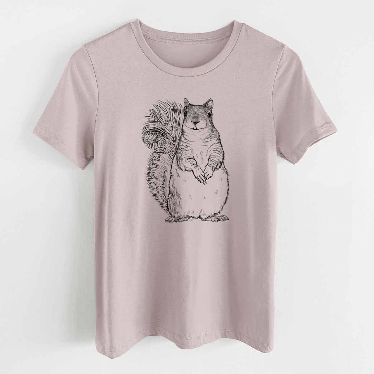 Pink gravel women's relaxed fit cotton t-shirt laid flat, printed with a detailed black ink illustration of a western grey squirrel sitting upright with a bushy tail.