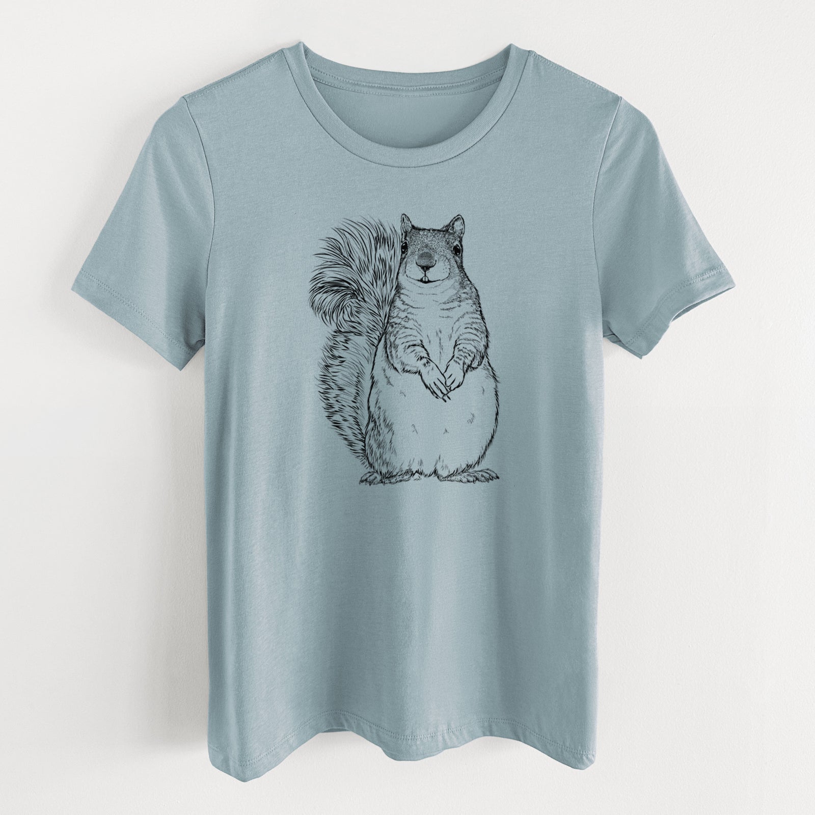 Vintage denim women's relaxed fit cotton t-shirt laid flat, printed with a detailed black ink illustration of a western grey squirrel sitting upright with a bushy tail.