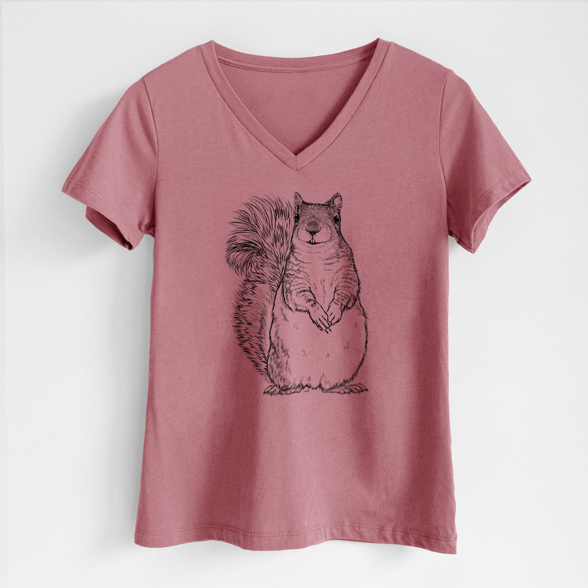 Mauve pink women's relaxed fit cotton V-neck t-shirt laid flat, printed with a detailed black ink illustration of a western grey squirrel sitting upright with a bushy tail.